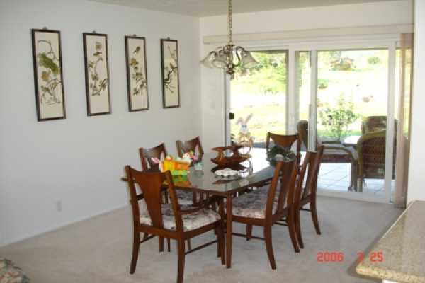275 Akolea Road Hilo, HI 96720 - Photo 8 of 11 a view of a dining room with furniture window and outside view