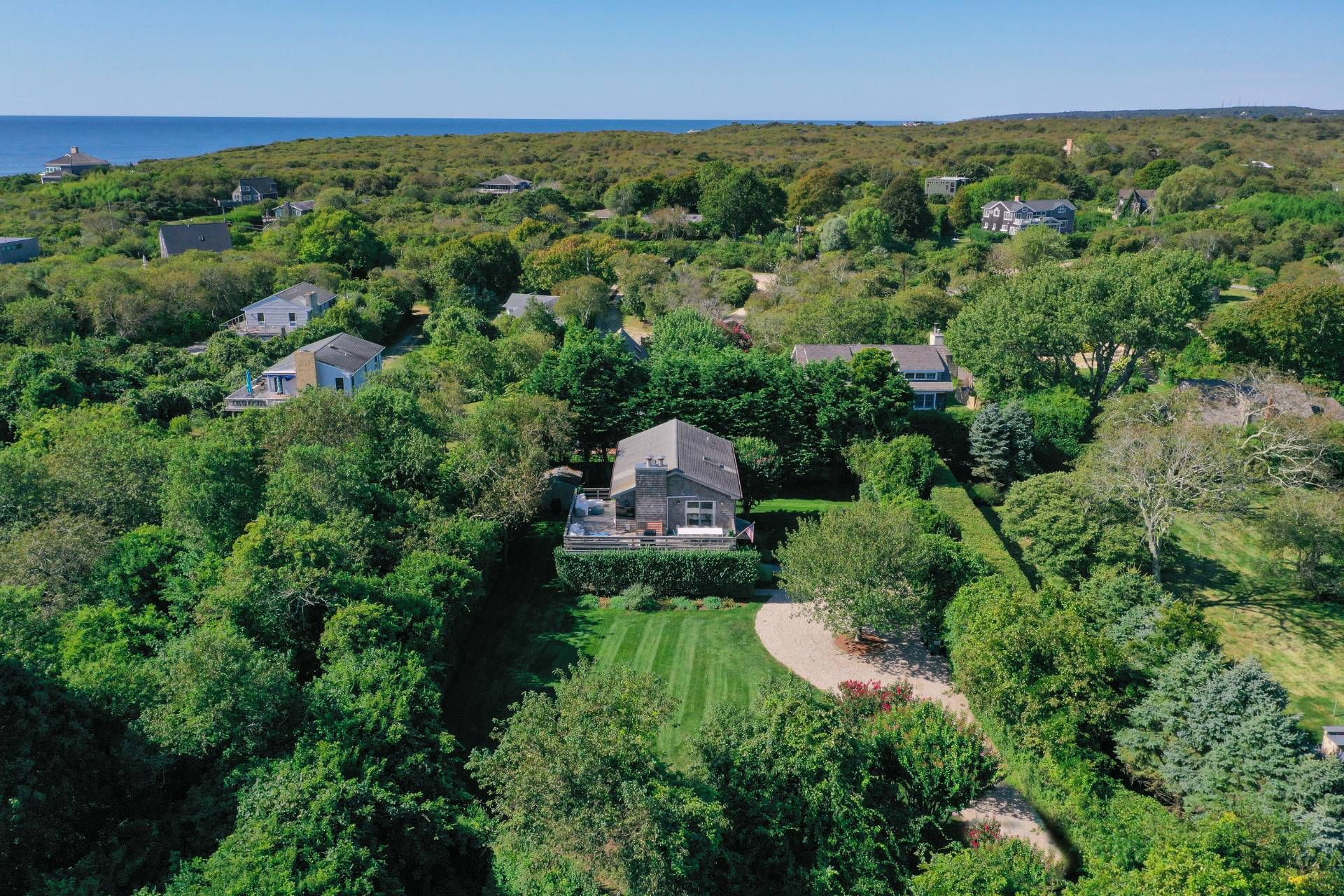 28 Ditch Plains Road Montauk, NY 11954 - Photo 27 of 30 an aerial view of a house with yard and green space
