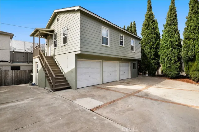 a view of a house with a garage and a garage