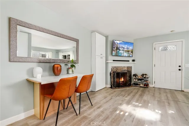 a view of a livingroom with furniture and a fireplace