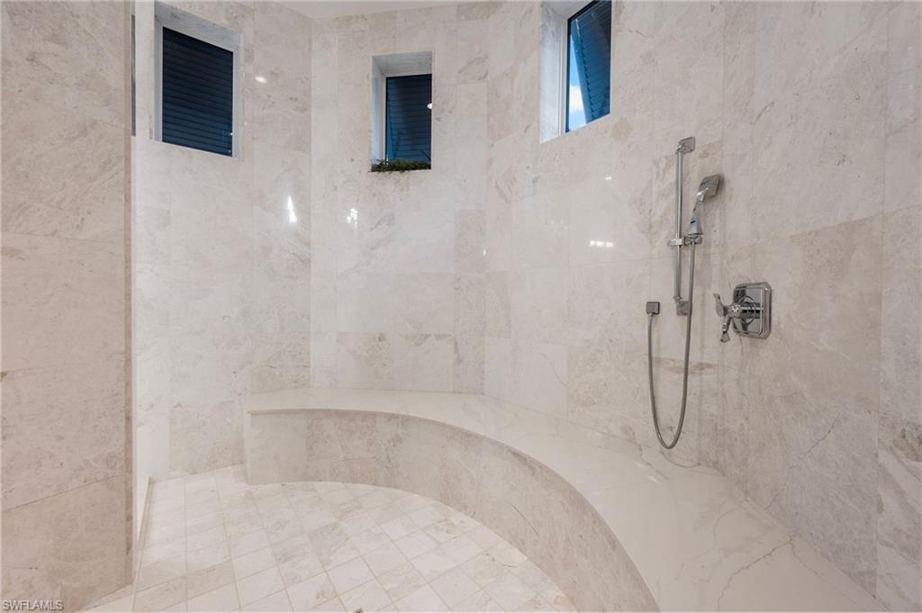 13851 Williston Way Naples, FL 34119 - Photo 21 of 50 a bathroom with a shower