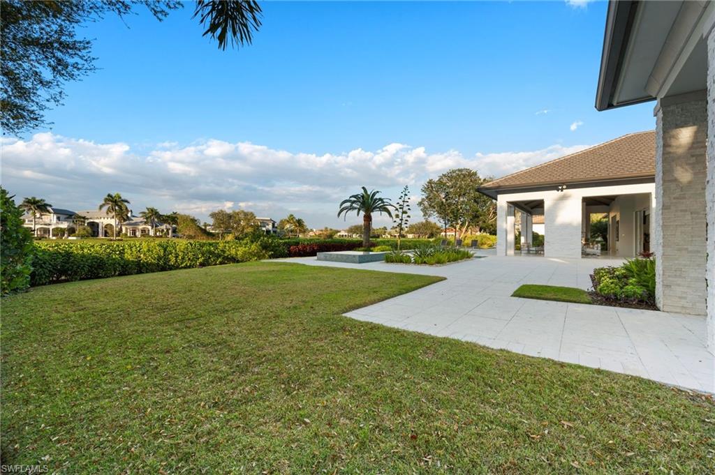 13851 Williston Way Naples, FL 34119 - Photo 46 of 50 a view of a house with a yard