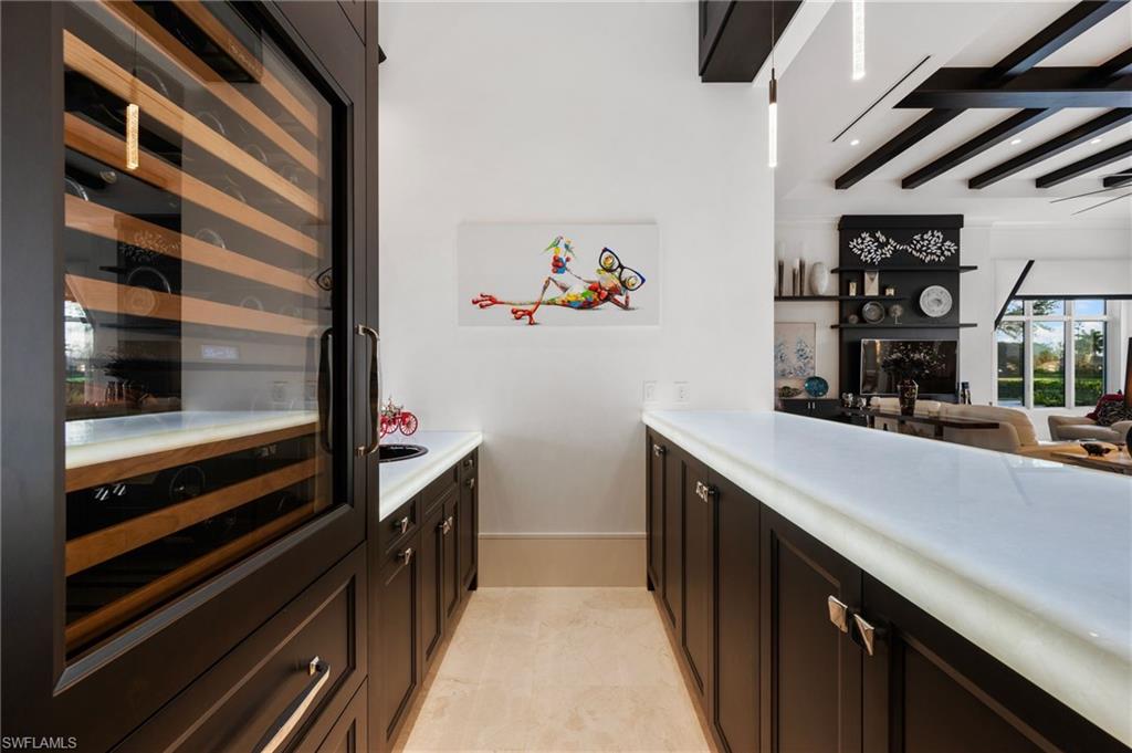 13851 Williston Way Naples, FL 34119 - Photo 10 of 50 a kitchen with lots of counter top space