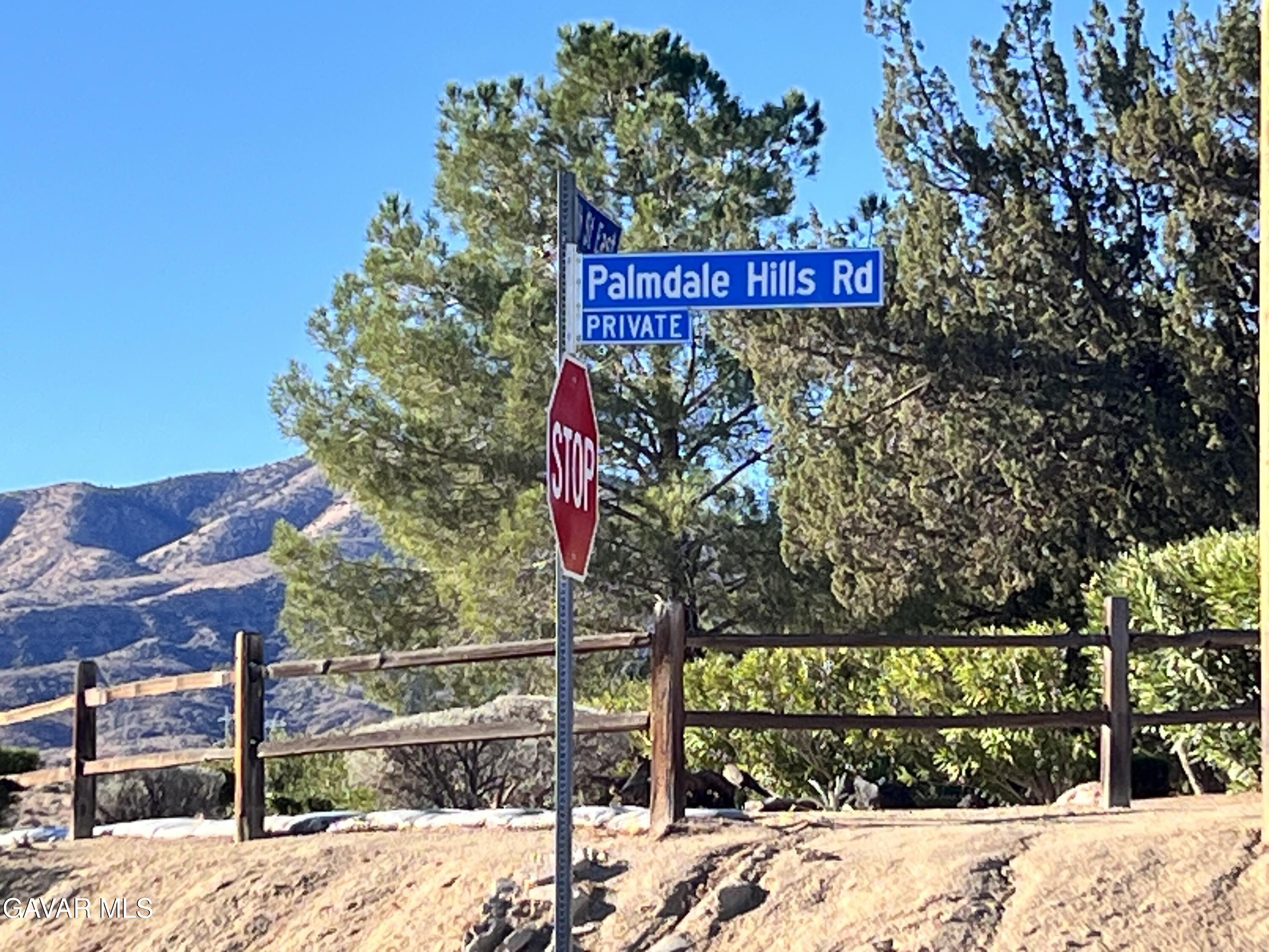 Vac/barrel Spring Road Palmdale, CA 93552 - Photo 13 of 33 a sign on the side of a road