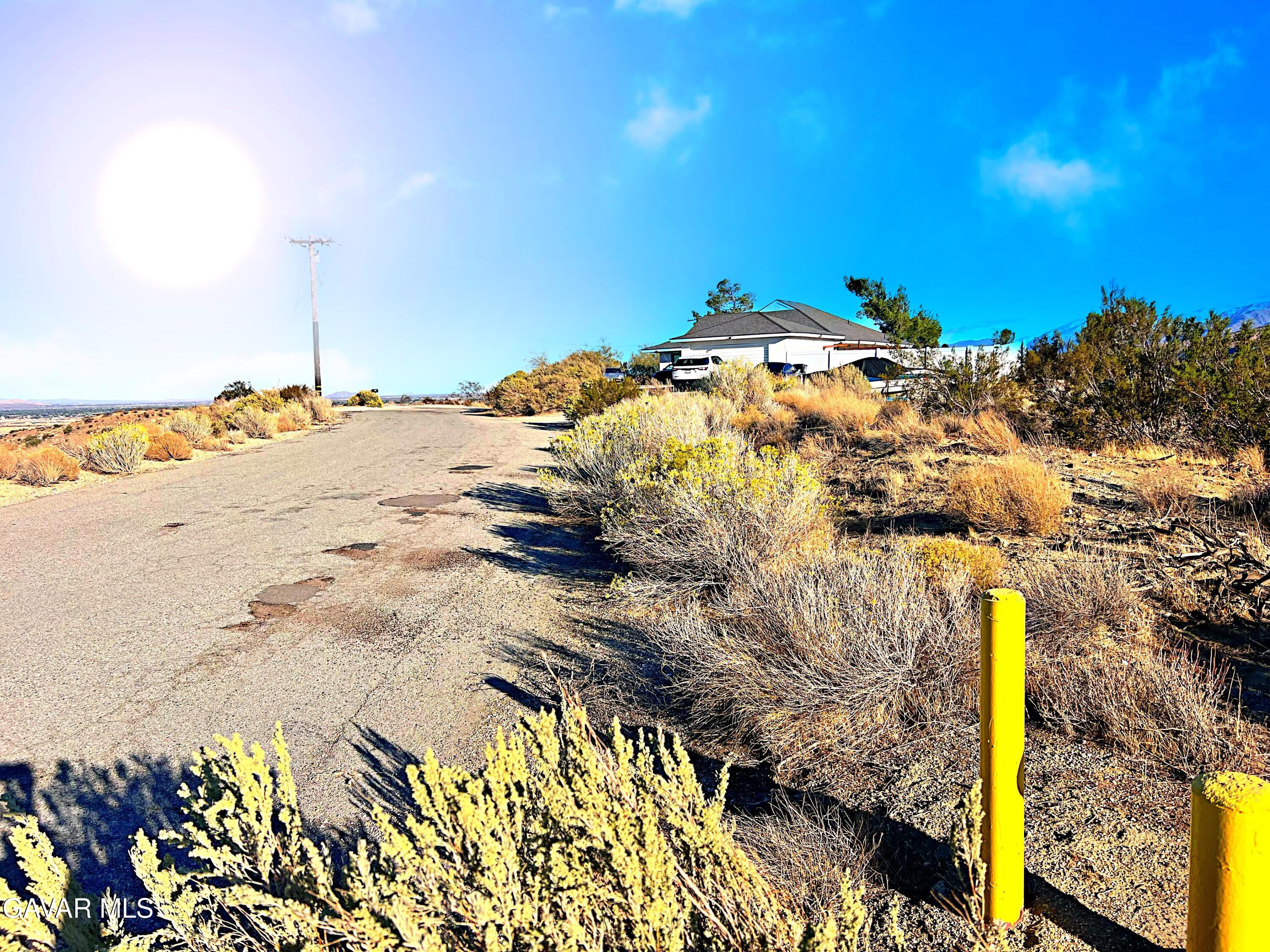 Vac/barrel Spring Road Palmdale, CA 93552 - Photo 18 of 33 a view of a pathway with a yard