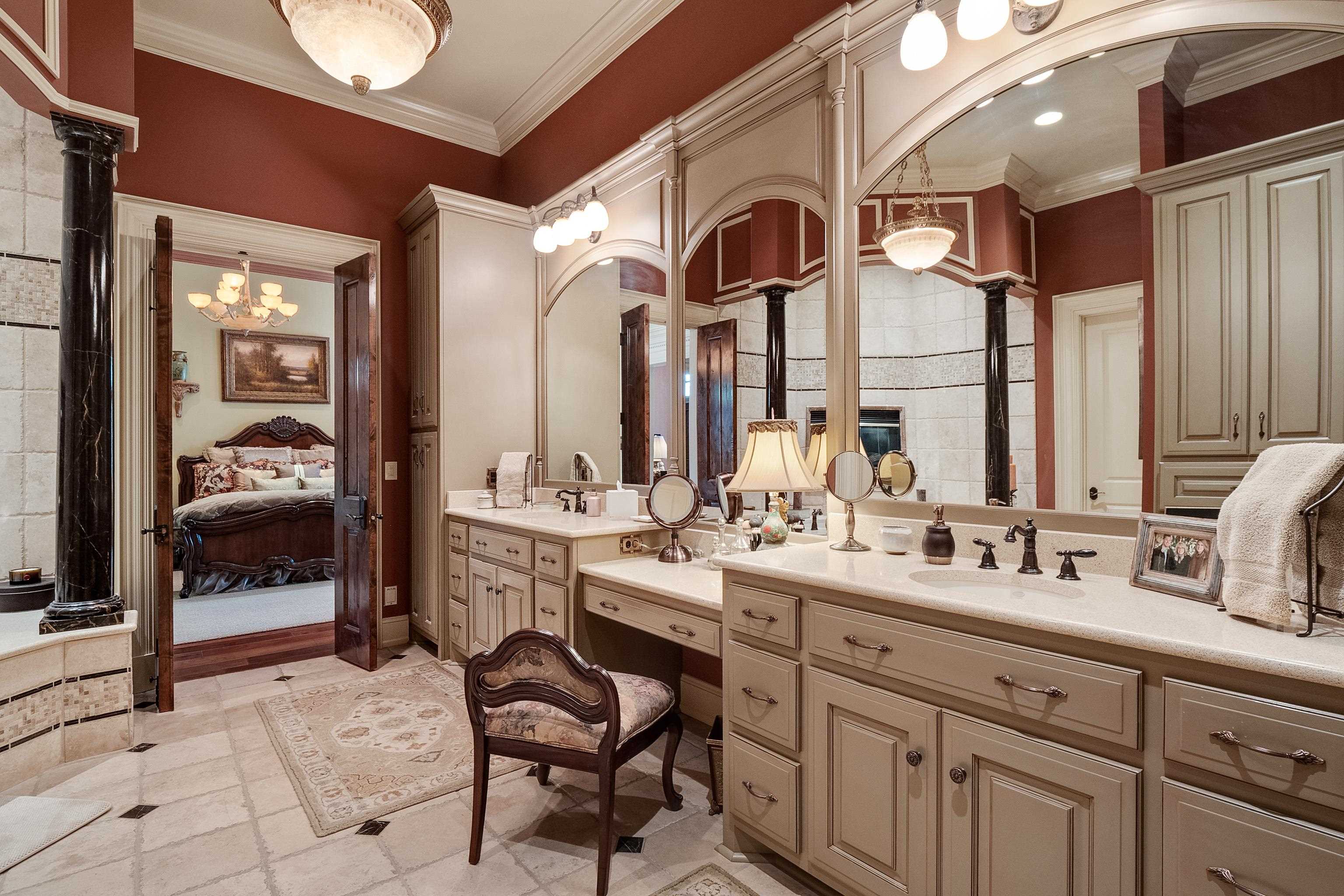 2000 Patrick Drive Corinth, MS 38834 - Photo 16 of 25 a hall with a sink and a mirror