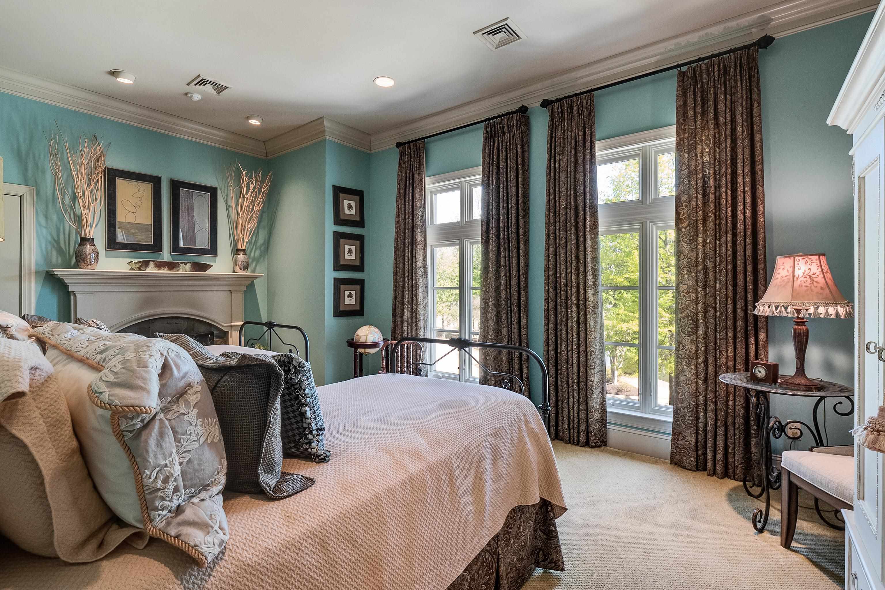 2000 Patrick Drive Corinth, MS 38834 - Photo 18 of 25 a bed room with a bed and a television