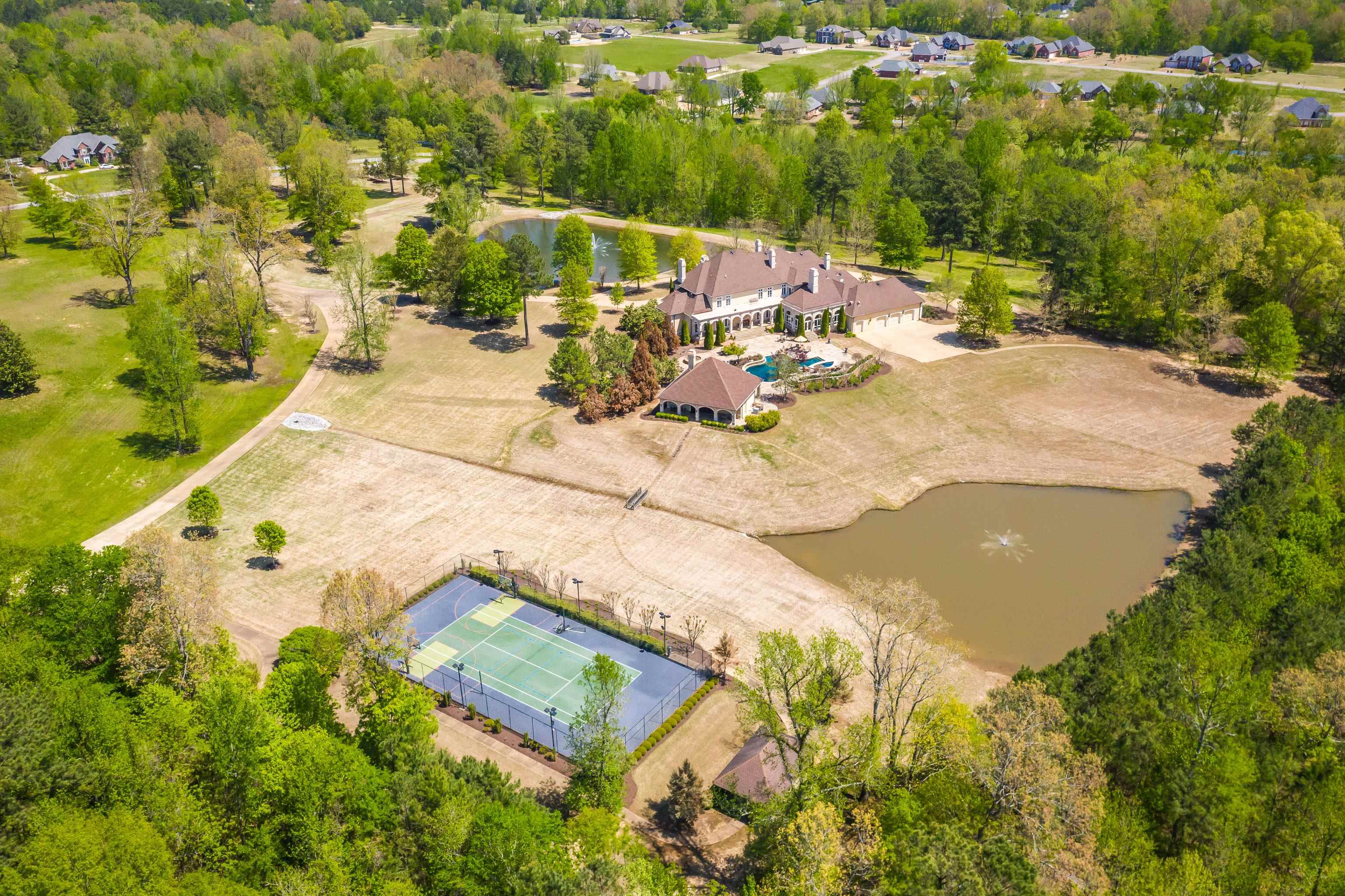 2000 Patrick Drive Corinth, MS 38834 - Photo 25 of 25 a view of a swimming pool with a yard