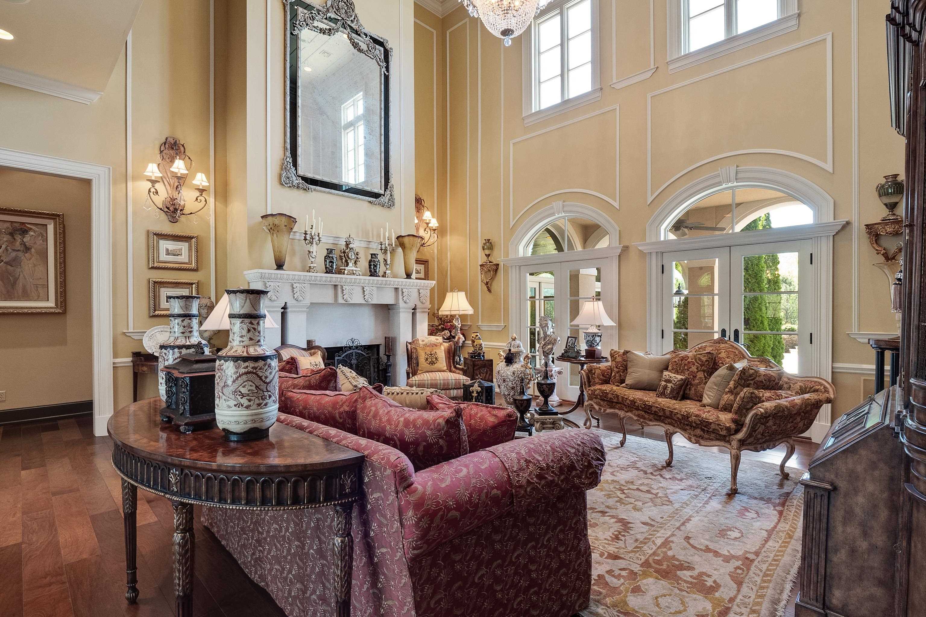 2000 Patrick Drive Corinth, MS 38834 - Photo 6 of 25 a living room with fireplace furniture and a large window