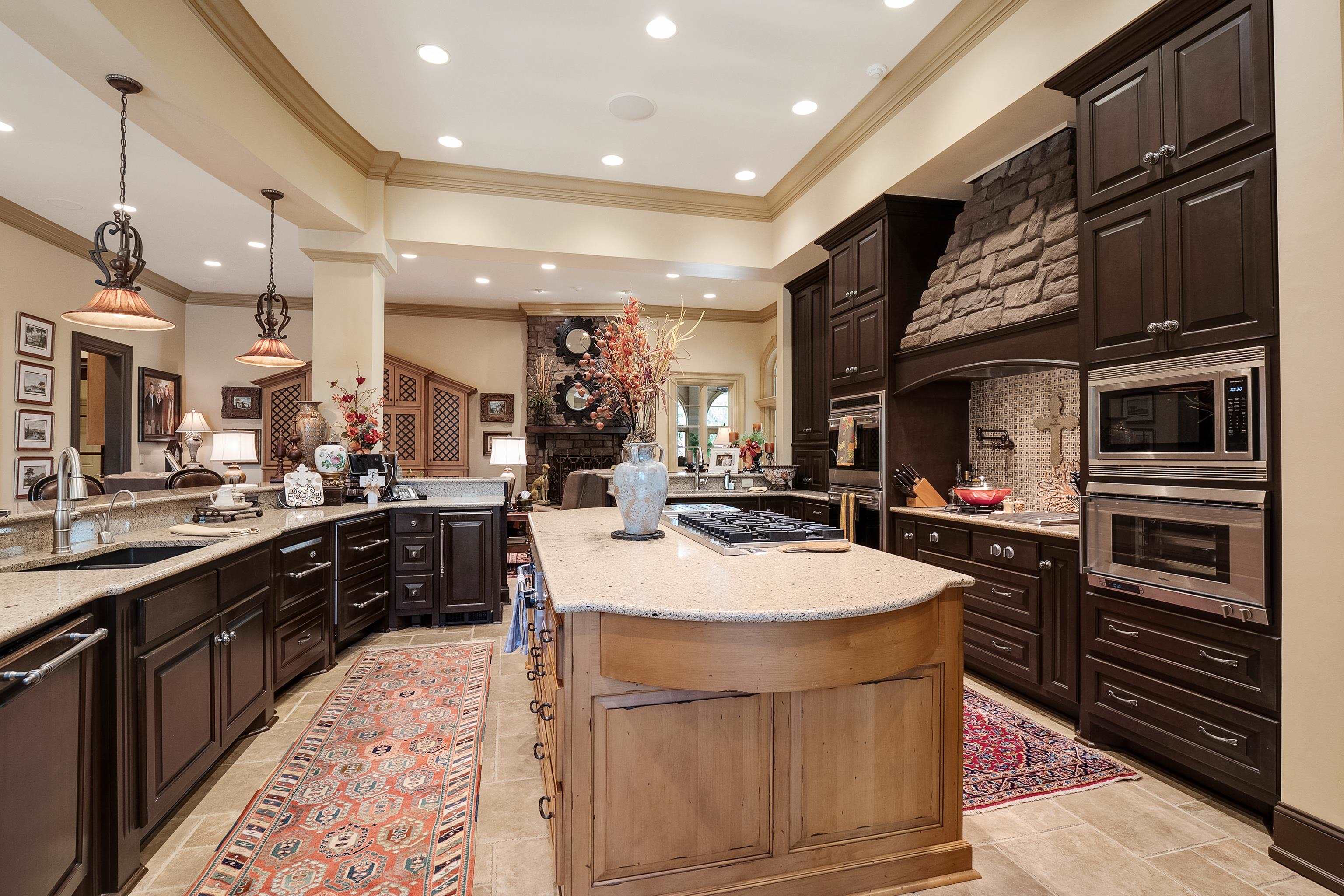 2000 Patrick Drive Corinth, MS 38834 - Photo 10 of 25 a kitchen with stainless steel appliances kitchen island granite countertop a sink and cabinets