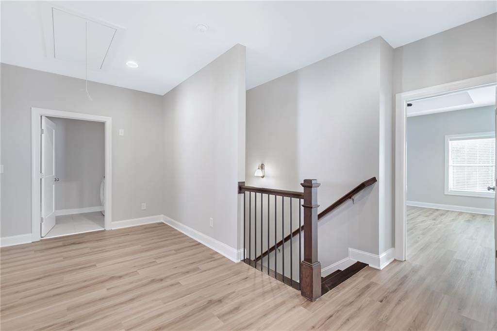 1859 Commons Place Atlanta, GA 30318 - Photo 20 of 53 a view of a hallway with wooden floor and entryway