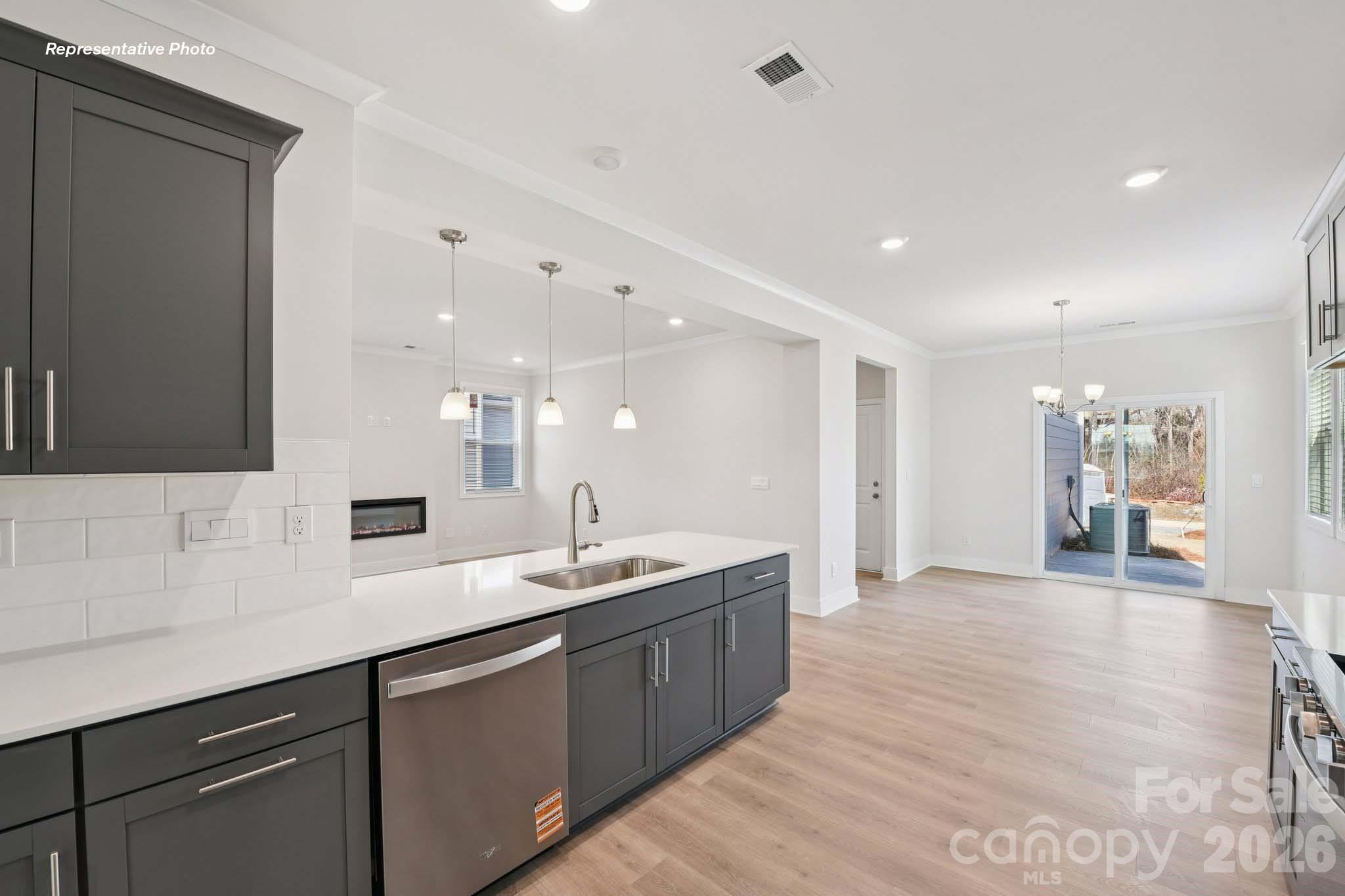 8905 Overhill Road Huntersville, NC 28078 - Photo 12 of 30 a large bathroom with a double vanity sink and a mirror