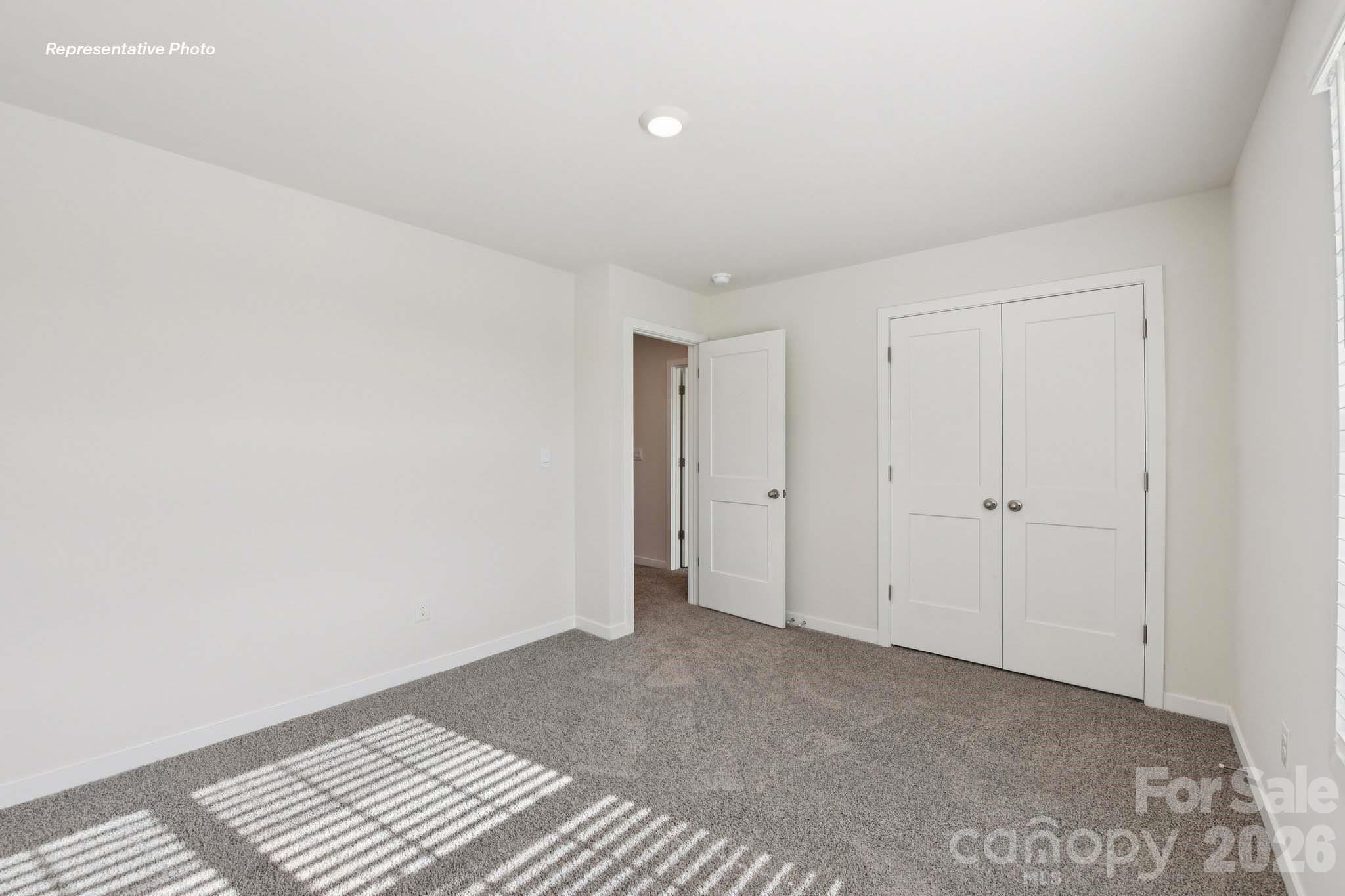 8905 Overhill Road Huntersville, NC 28078 - Photo 17 of 30 a view of an empty room