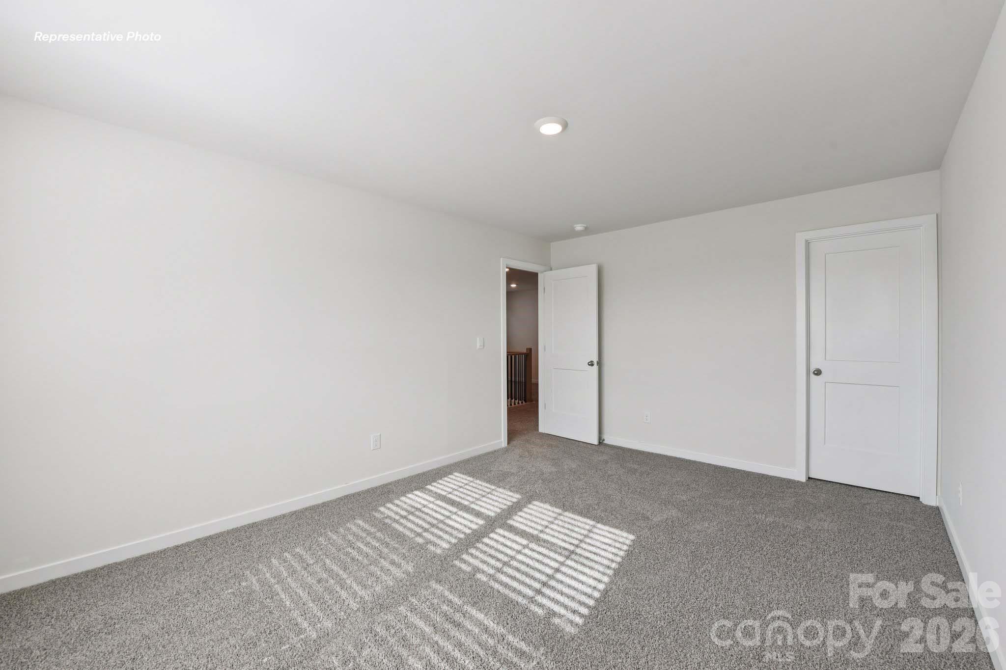 8905 Overhill Road Huntersville, NC 28078 - Photo 19 of 30 a view of an empty room
