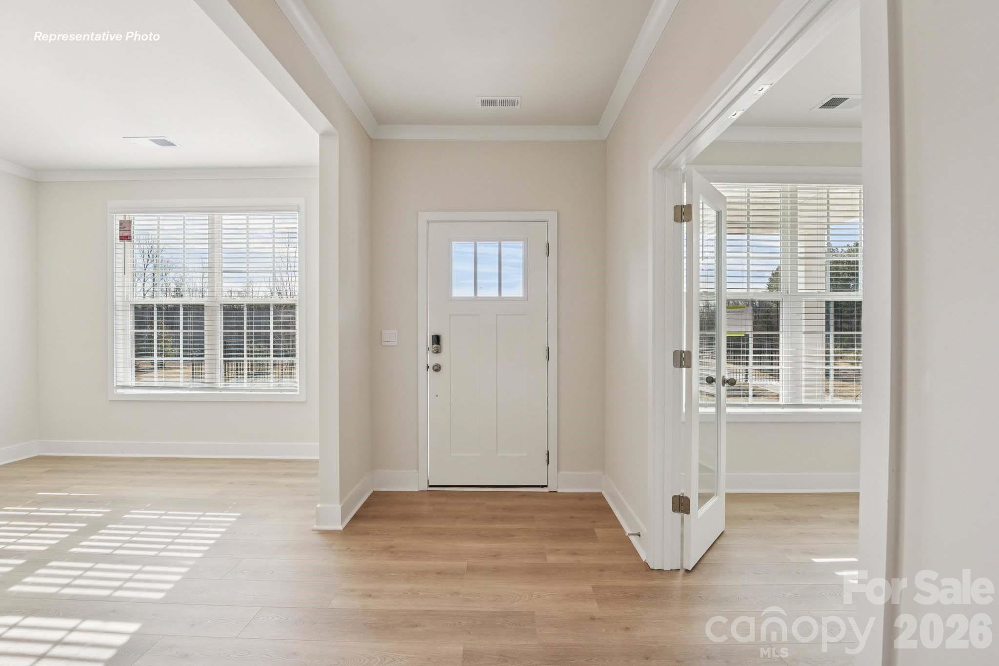 8905 Overhill Road Huntersville, NC 28078 - Photo 2 of 30 an empty room with windows