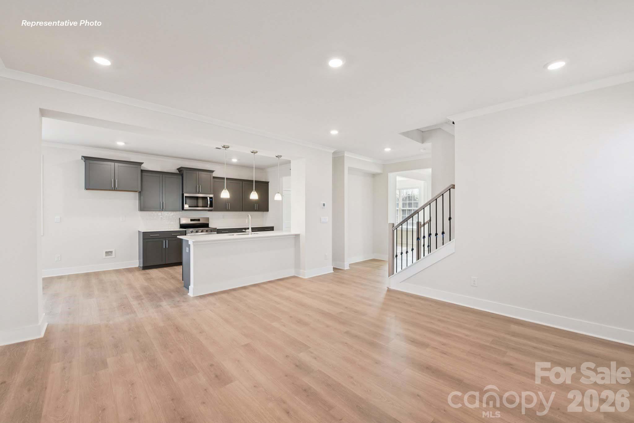 8905 Overhill Road Huntersville, NC 28078 - Photo 8 of 30 a view of kitchen with stove and cabinets
