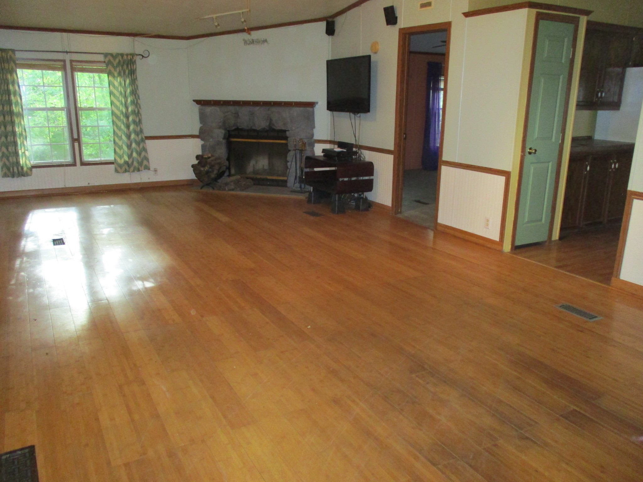 1112 Lecomte Road Dickson, TN 37055 - Photo 12 of 33 a view of a livingroom with furniture and a fireplace
