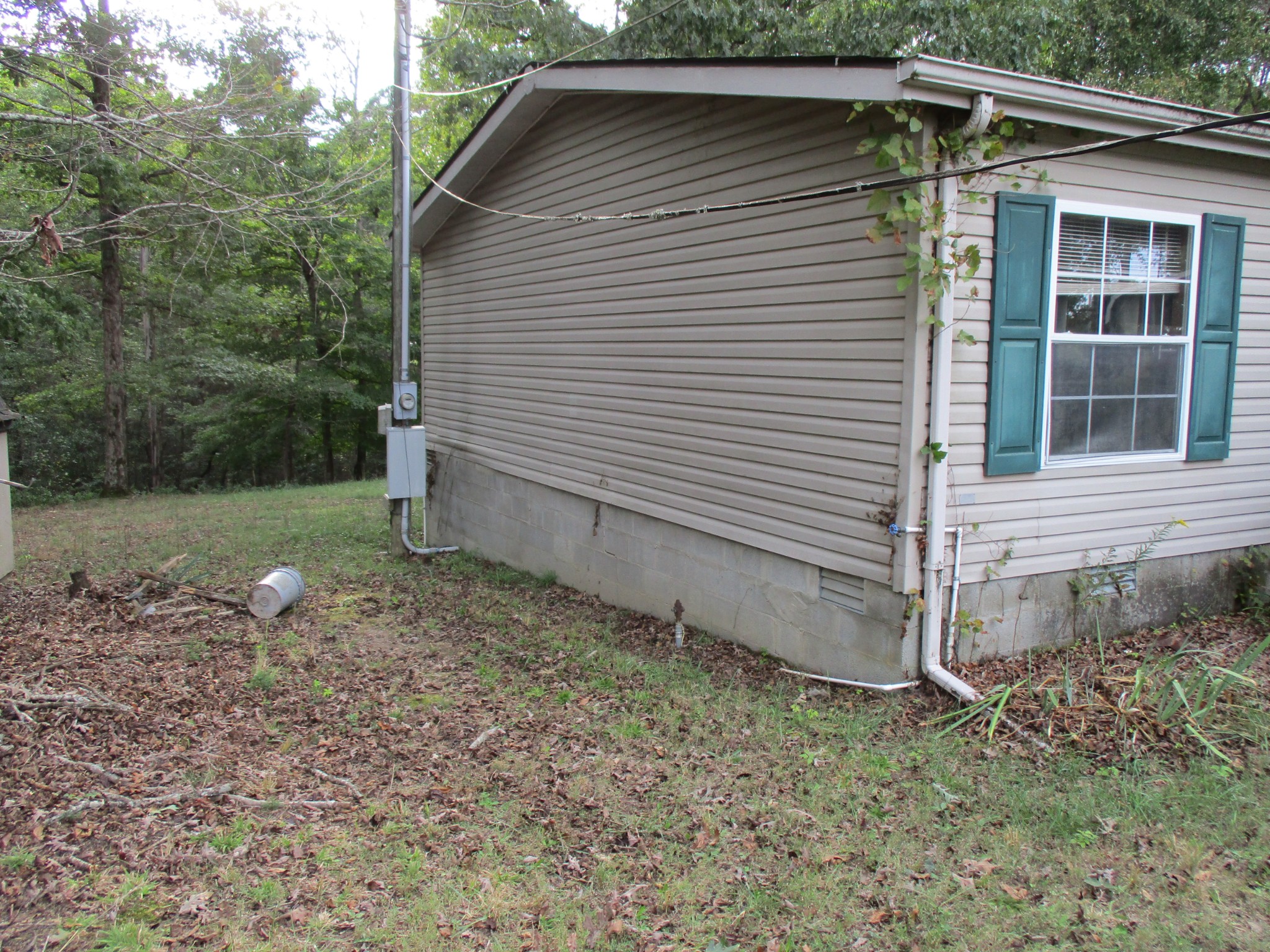1112 Lecomte Road Dickson, TN 37055 - Photo 29 of 33 a view of a small house with yard