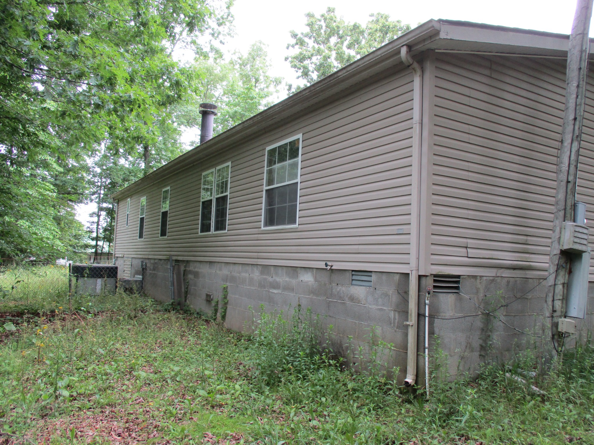 1112 Lecomte Road Dickson, TN 37055 - Photo 3 of 33 a view of a house with a yard