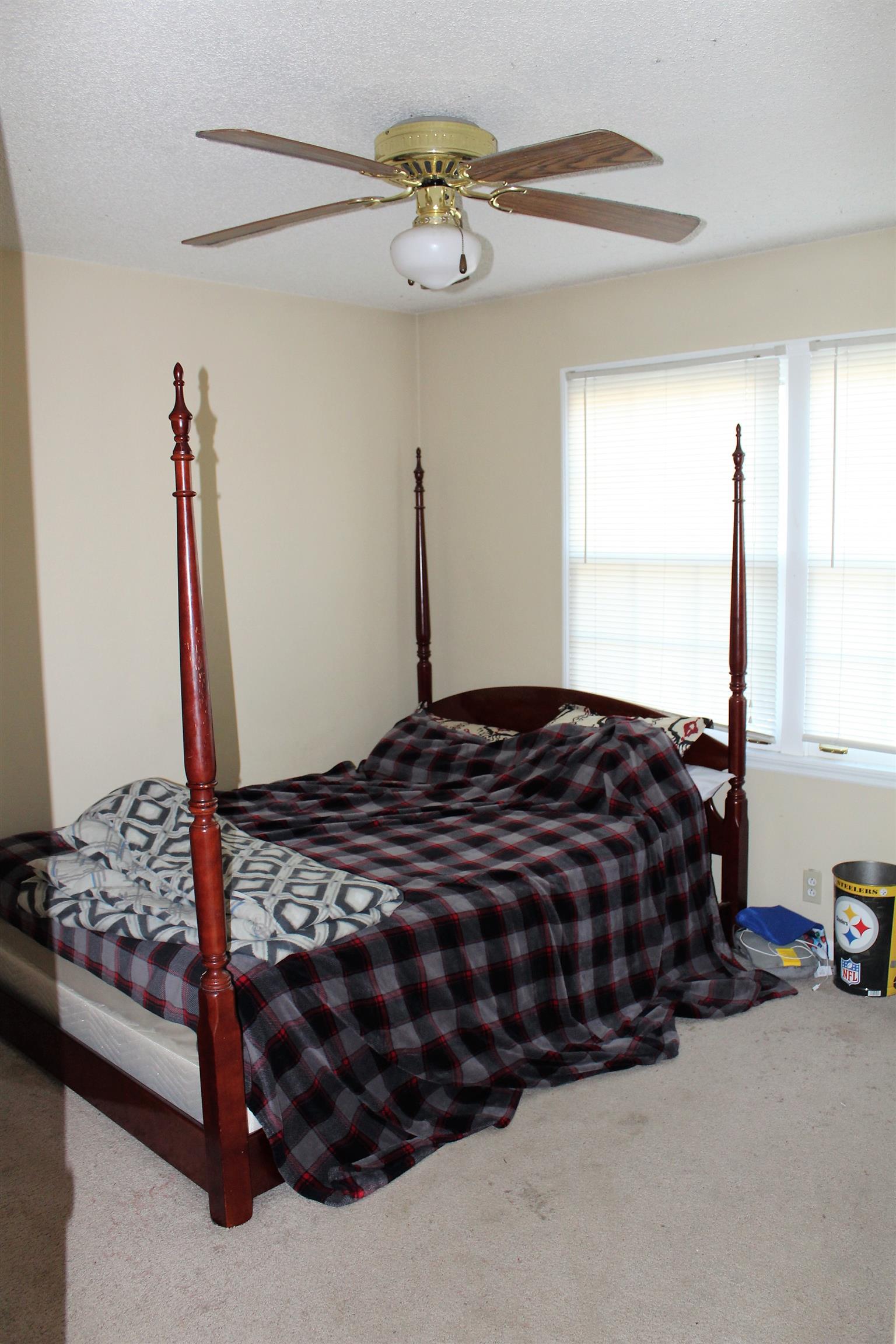 125 Jones Creek Road Dickson, TN 37055 - Photo 15 of 16 a bedroom with a bed and window