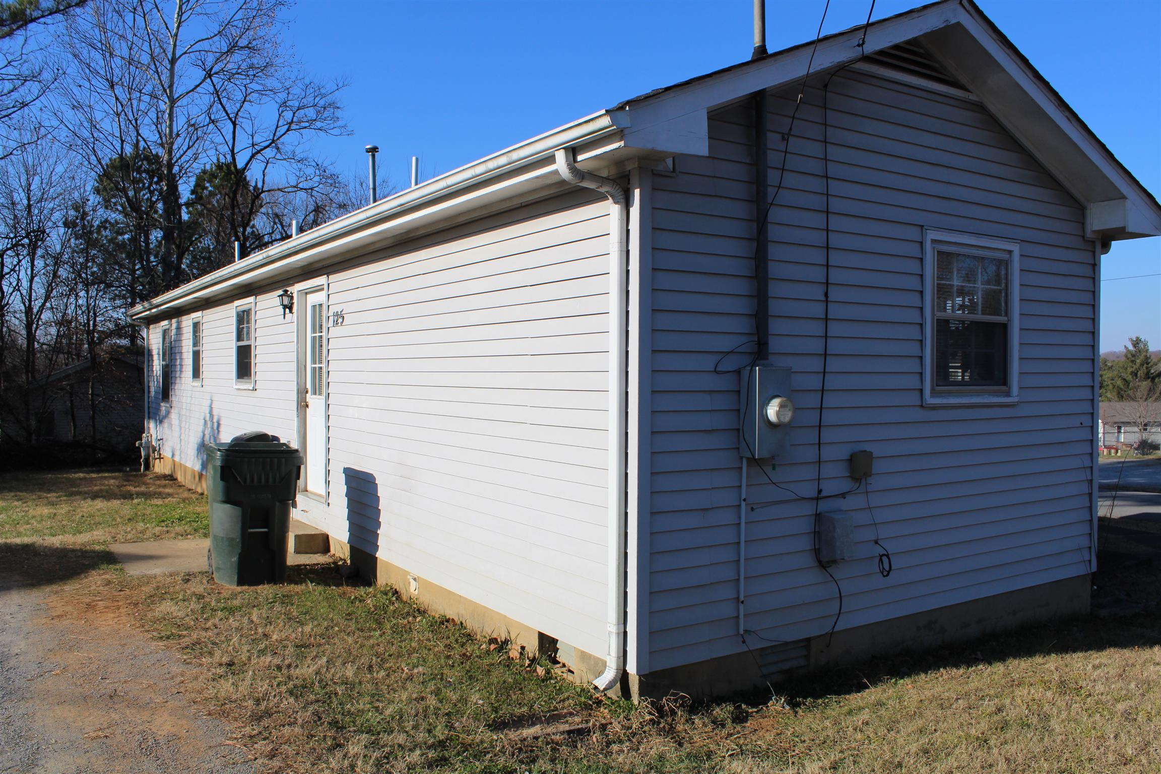 125 Jones Creek Road Dickson, TN 37055 - Photo 4 of 16 a view of a back yard of the house