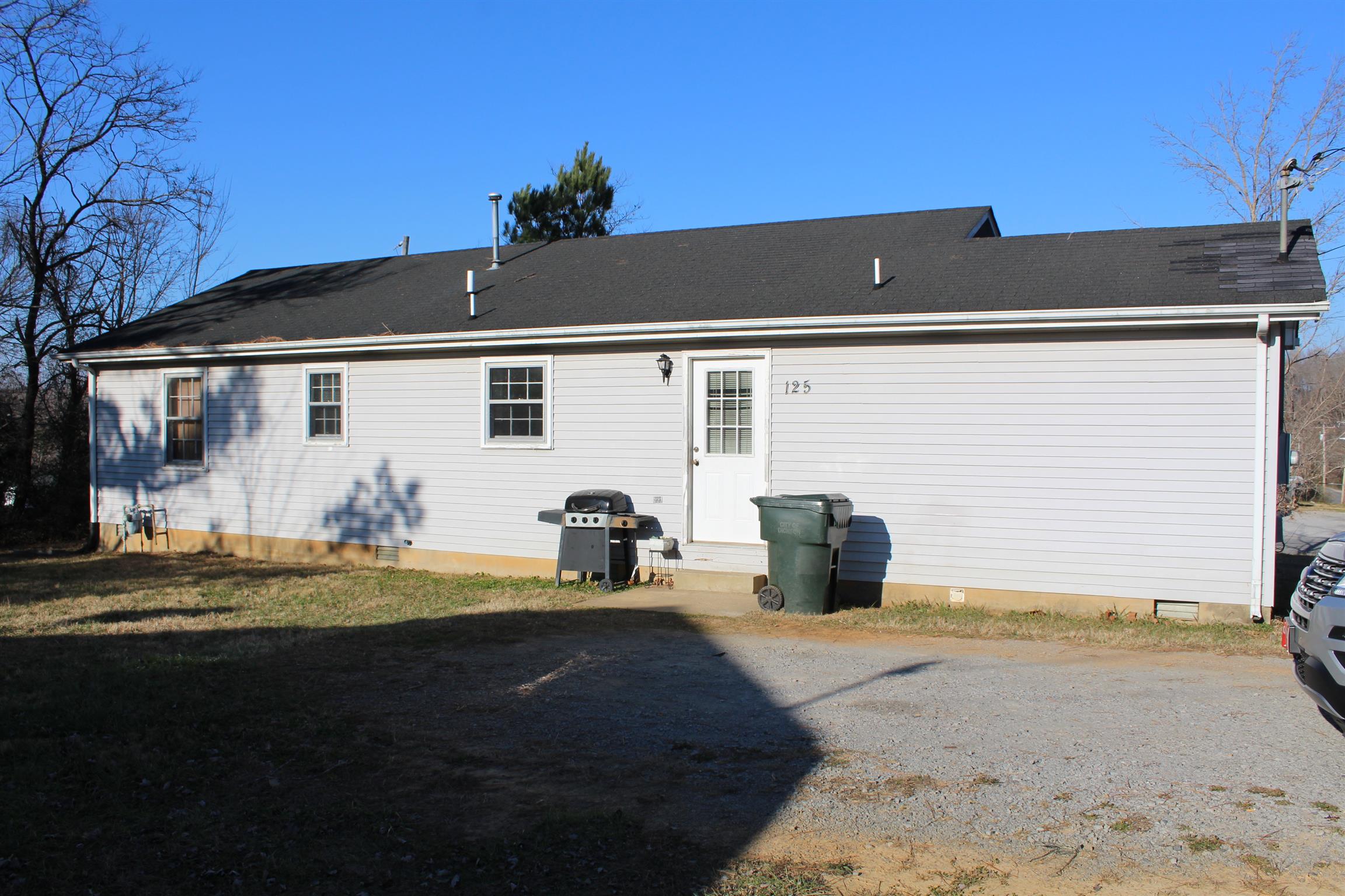 125 Jones Creek Road Dickson, TN 37055 - Photo 5 of 16 a view of a backyard of the house