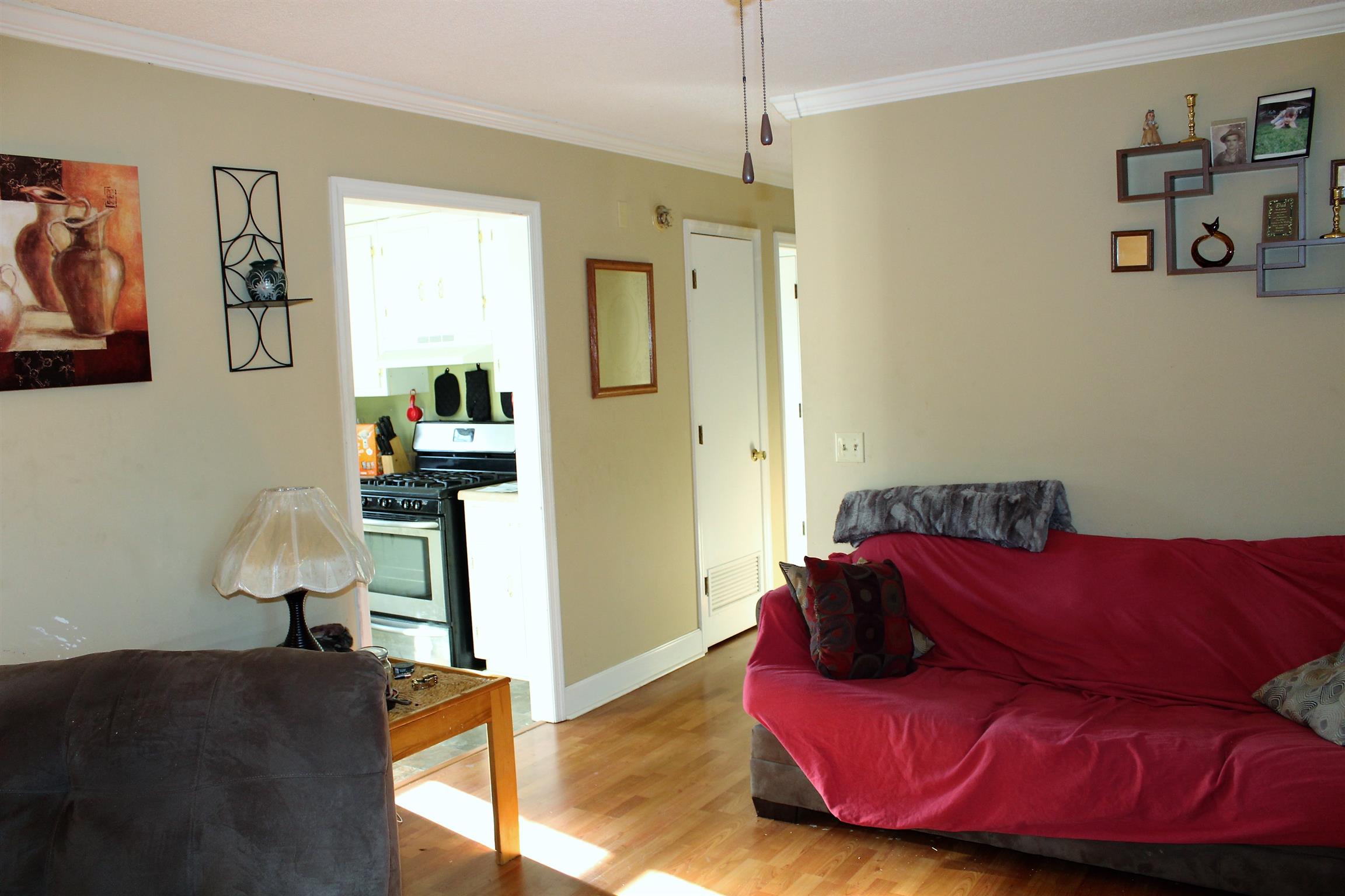 125 Jones Creek Road Dickson, TN 37055 - Photo 8 of 16 a living room with furniture and a wooden floor