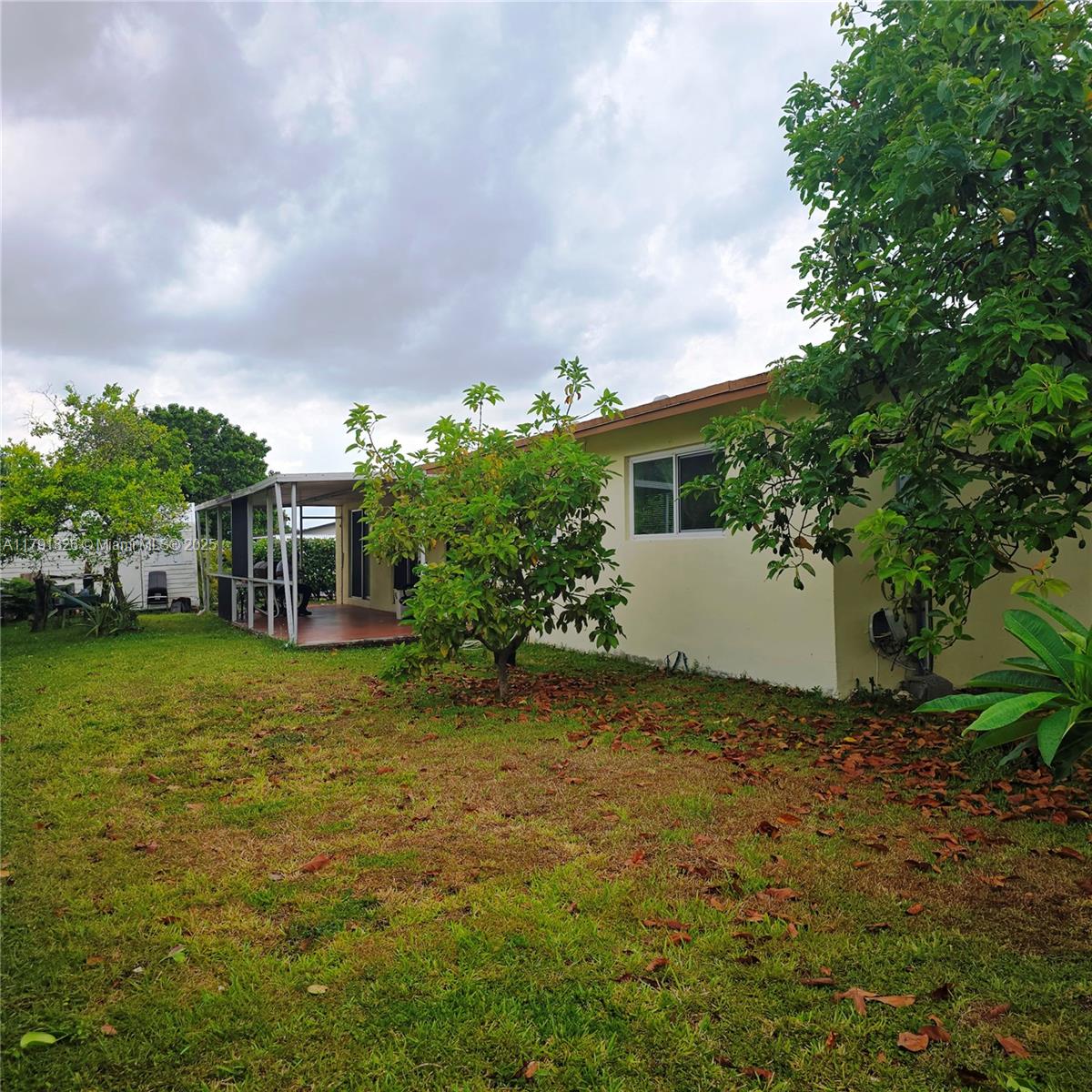 12900 Southwest 81st Street Miami, FL 33183 - Photo 17 of 19 a view of a house with backyard and garden