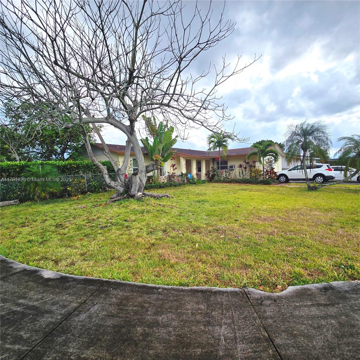 12900 Southwest 81st Street Miami, FL 33183 - Photo 19 of 19 a view of a city with lawn chairs and a big yard