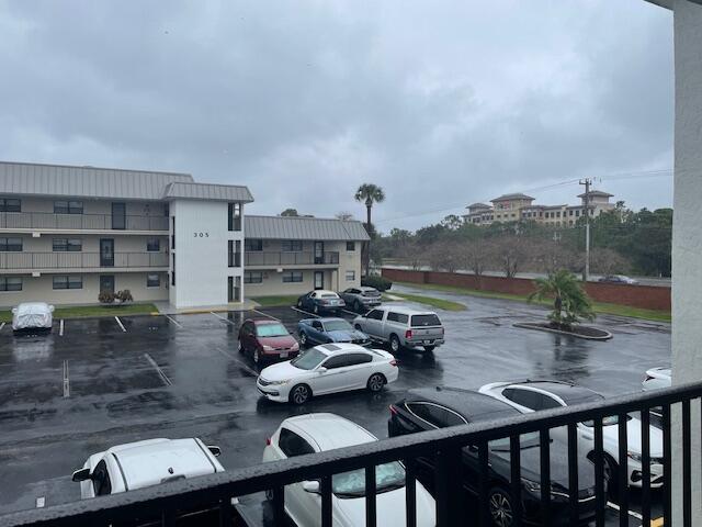 315 Tangle Run Boulevard, Unit 1023 Melbourne, FL 32940 - Photo 3 of 17 a living room with furniture