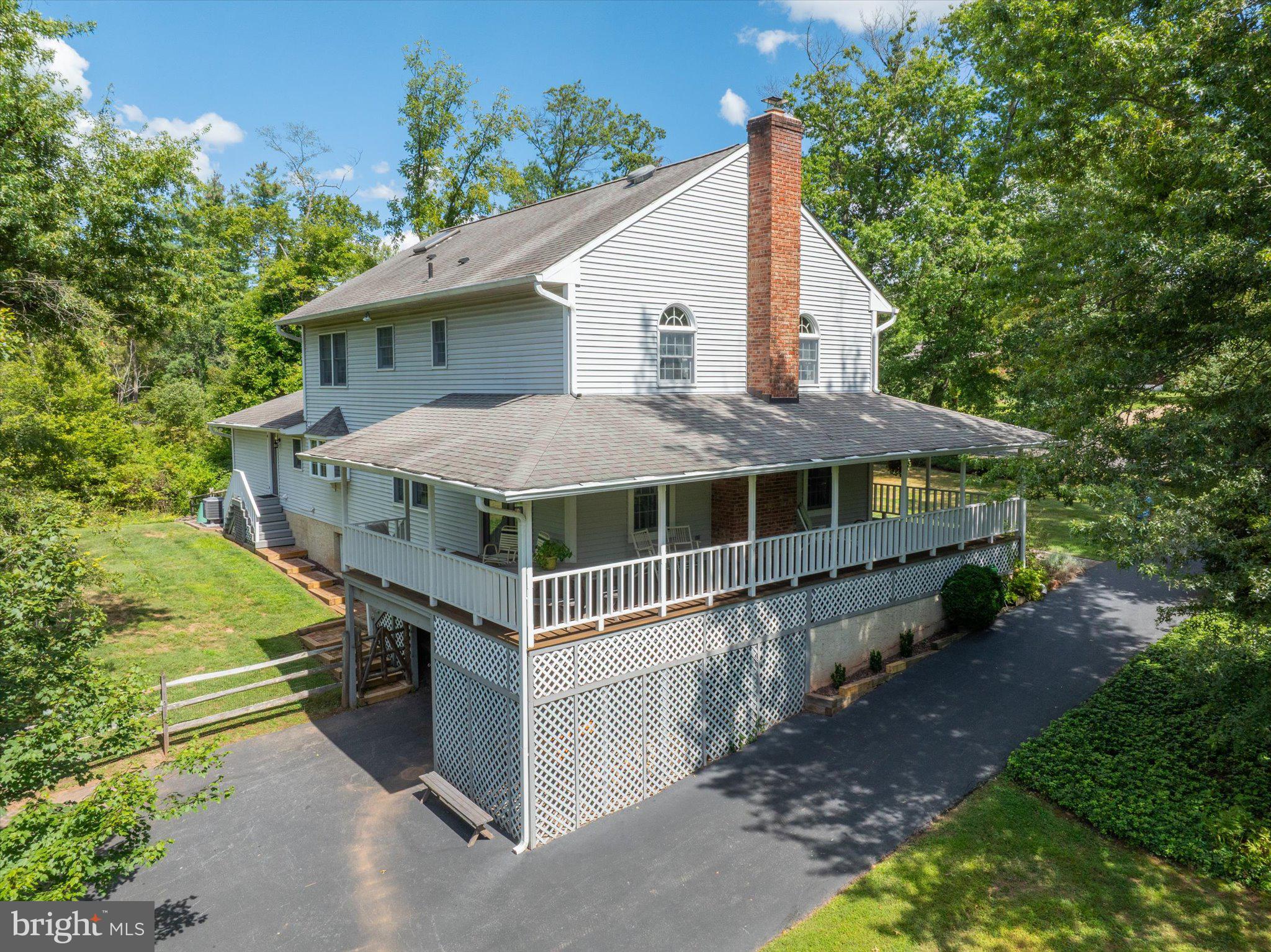 1655 Kriebel Mill Road Collegeville, PA 19426 - Photo 11 of 57 a house with trees in front of it