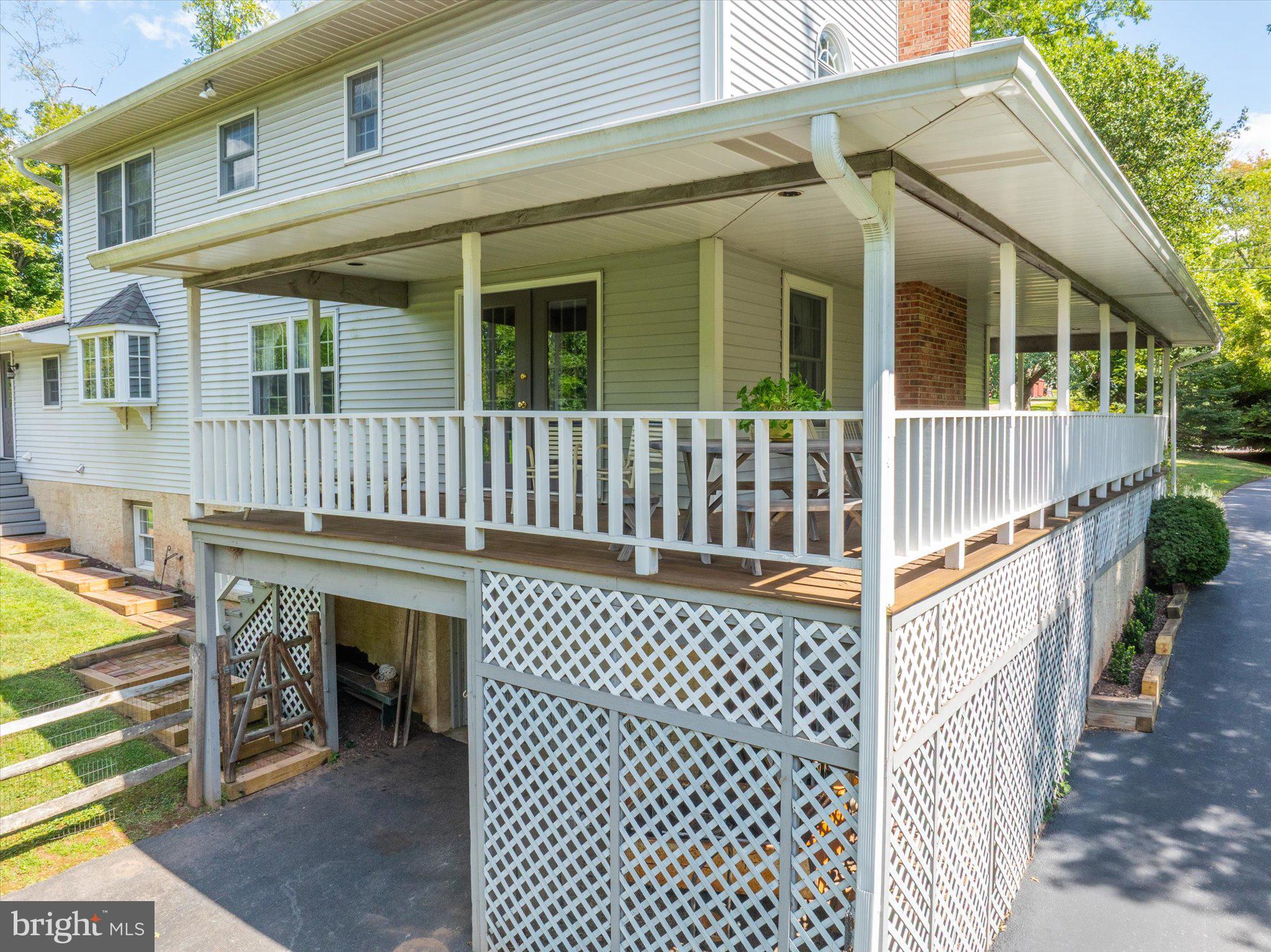 1655 Kriebel Mill Road Collegeville, PA 19426 - Photo 12 of 57 a view of a house with wooden deck