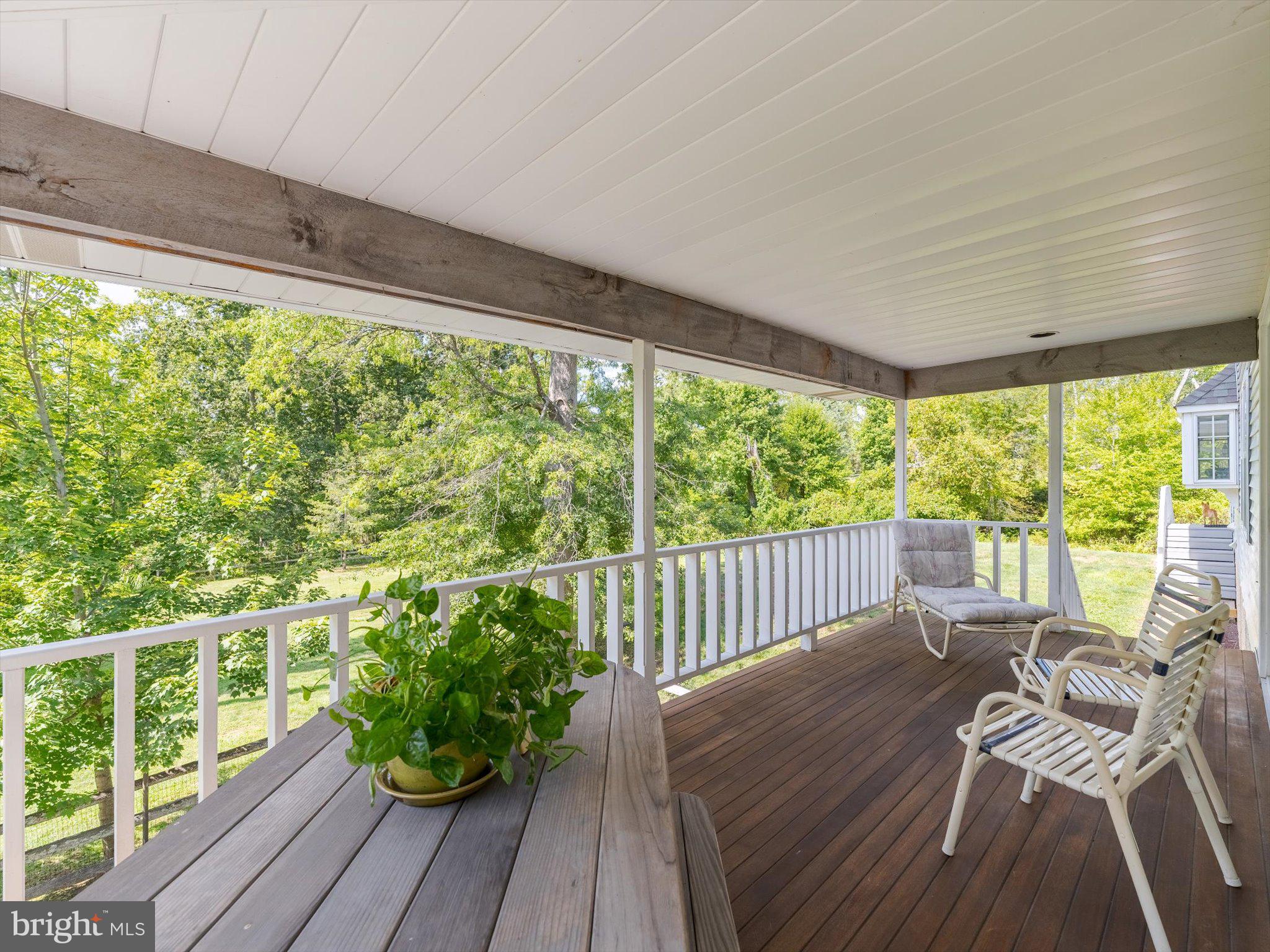 1655 Kriebel Mill Road Collegeville, PA 19426 - Photo 16 of 57 a view of a balcony with wooden floor