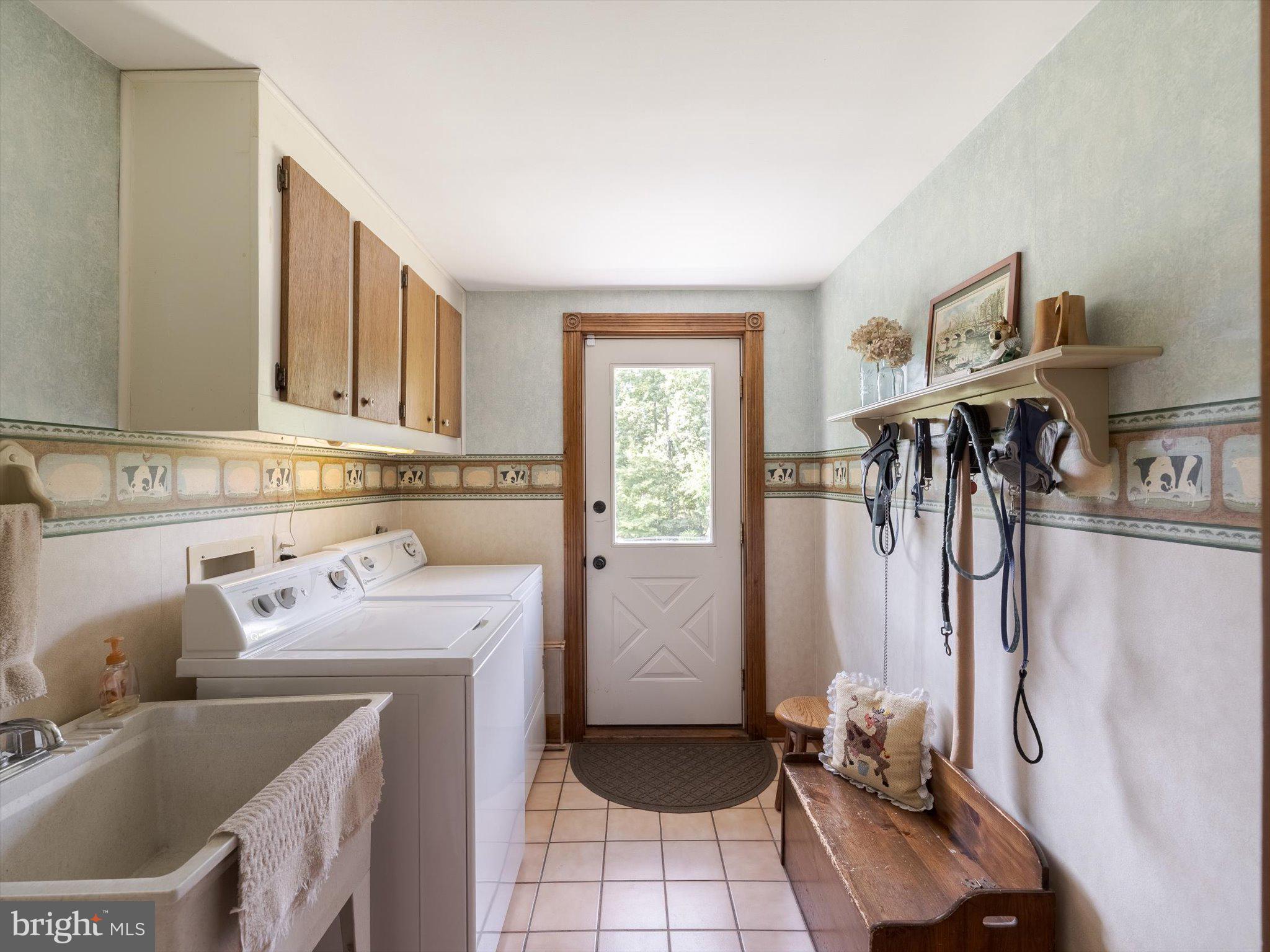 1655 Kriebel Mill Road Collegeville, PA 19426 - Photo 32 of 57 a utility room with sink dryer and washer