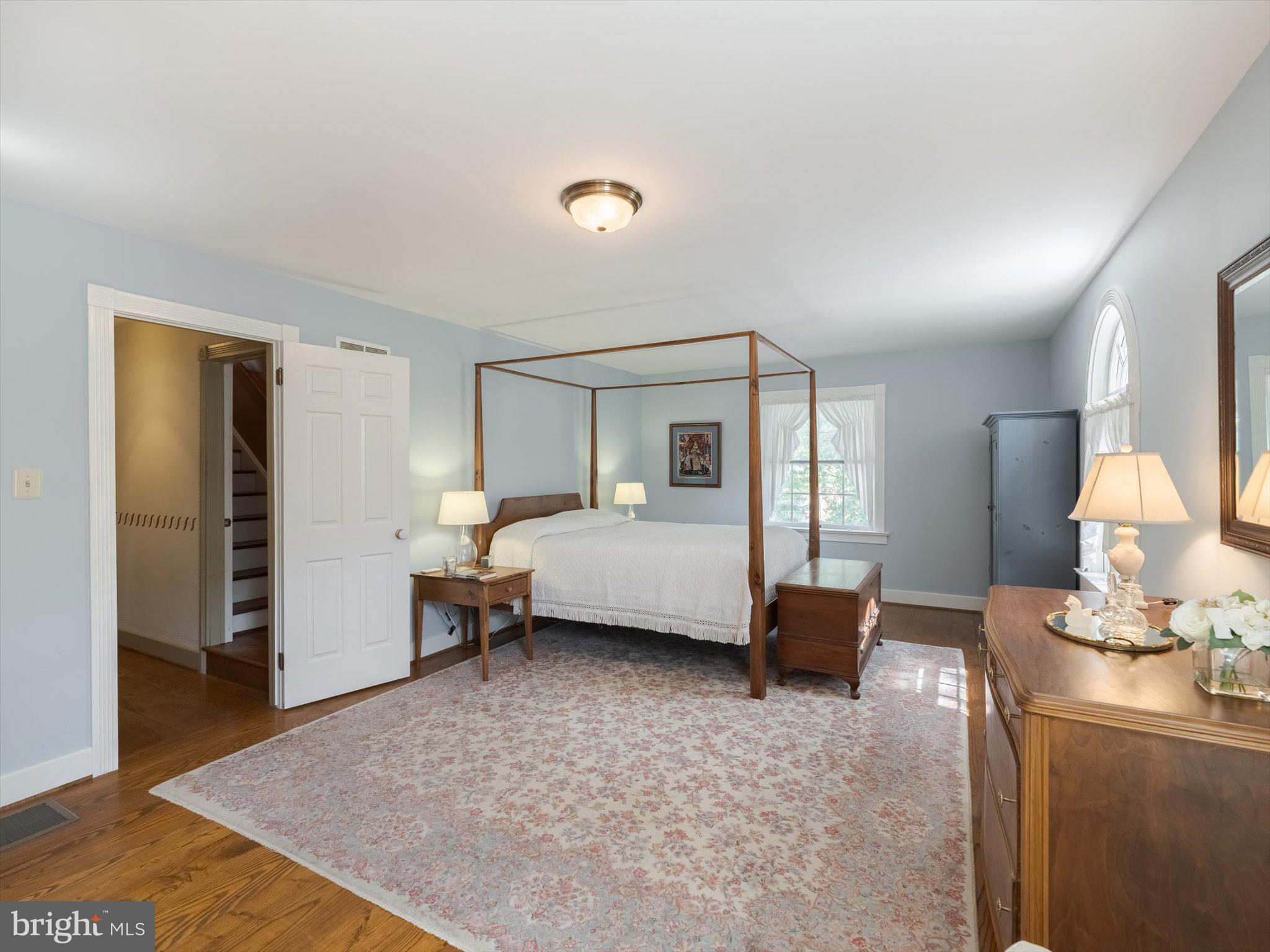 1655 Kriebel Mill Road Collegeville, PA 19426 - Photo 36 of 57 a bedroom with a bed and wooden floor
