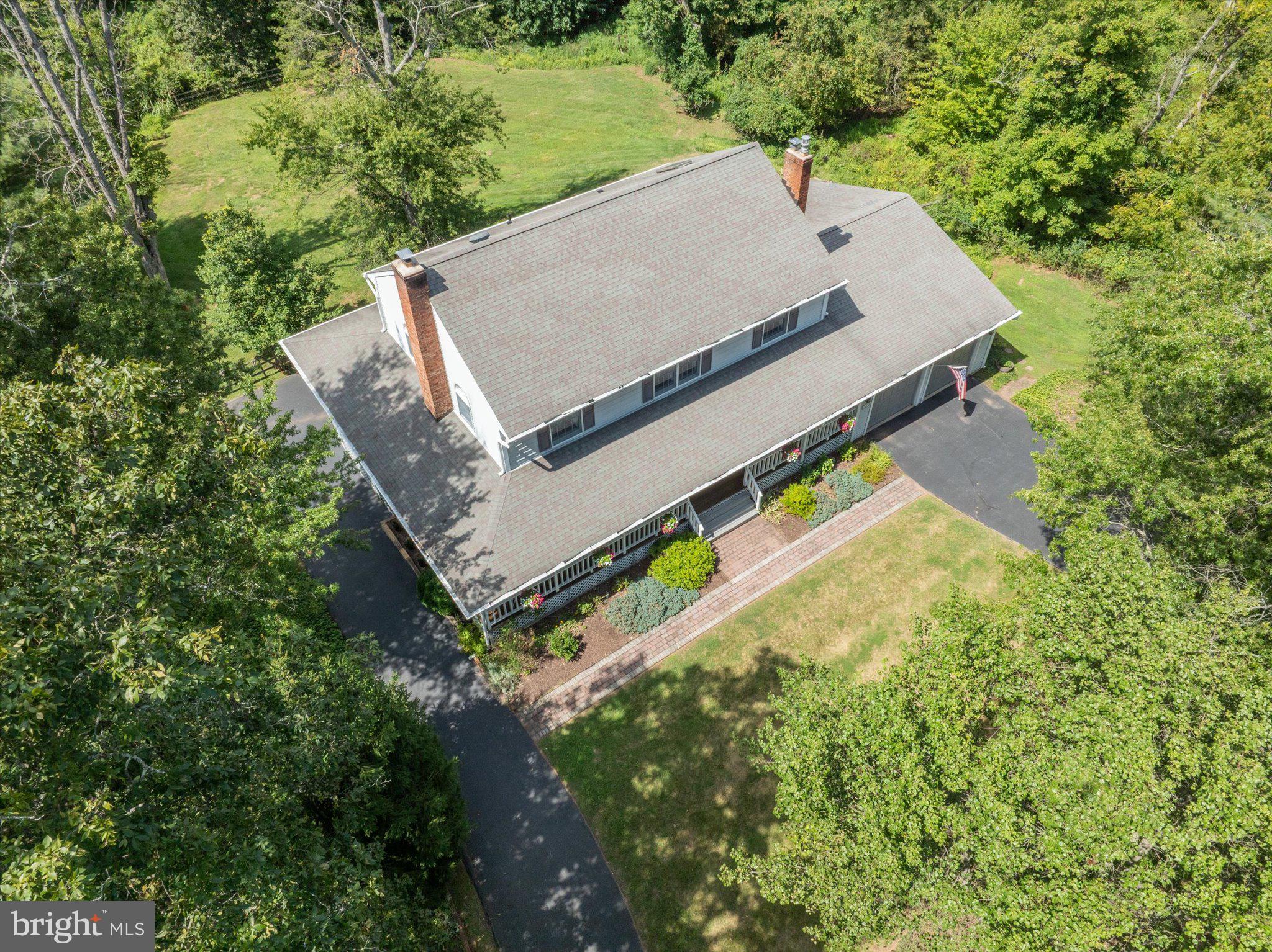 1655 Kriebel Mill Road Collegeville, PA 19426 - Photo 4 of 57 an aerial view of a house with a yard
