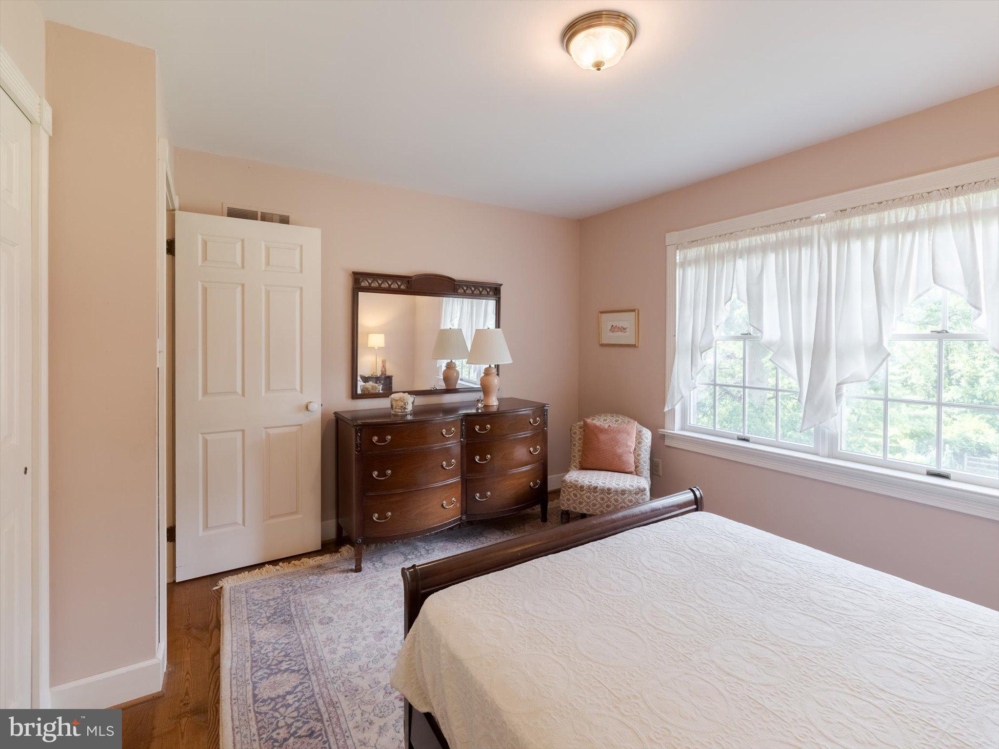 1655 Kriebel Mill Road Collegeville, PA 19426 - Photo 42 of 57 a bedroom with a bed and wooden floor