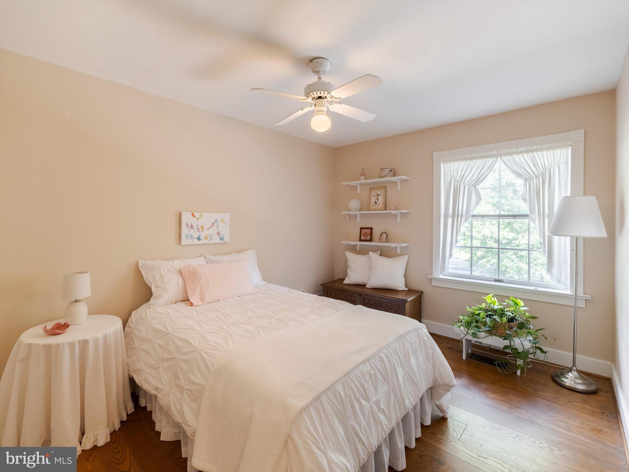 1655 Kriebel Mill Road Collegeville, PA 19426 - Photo 45 of 57 a bedroom with a bed and a chandelier