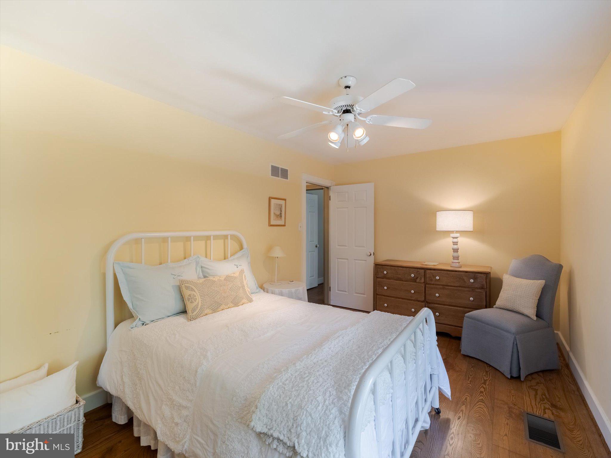 1655 Kriebel Mill Road Collegeville, PA 19426 - Photo 46 of 57 a bedroom with a bed and a lamp