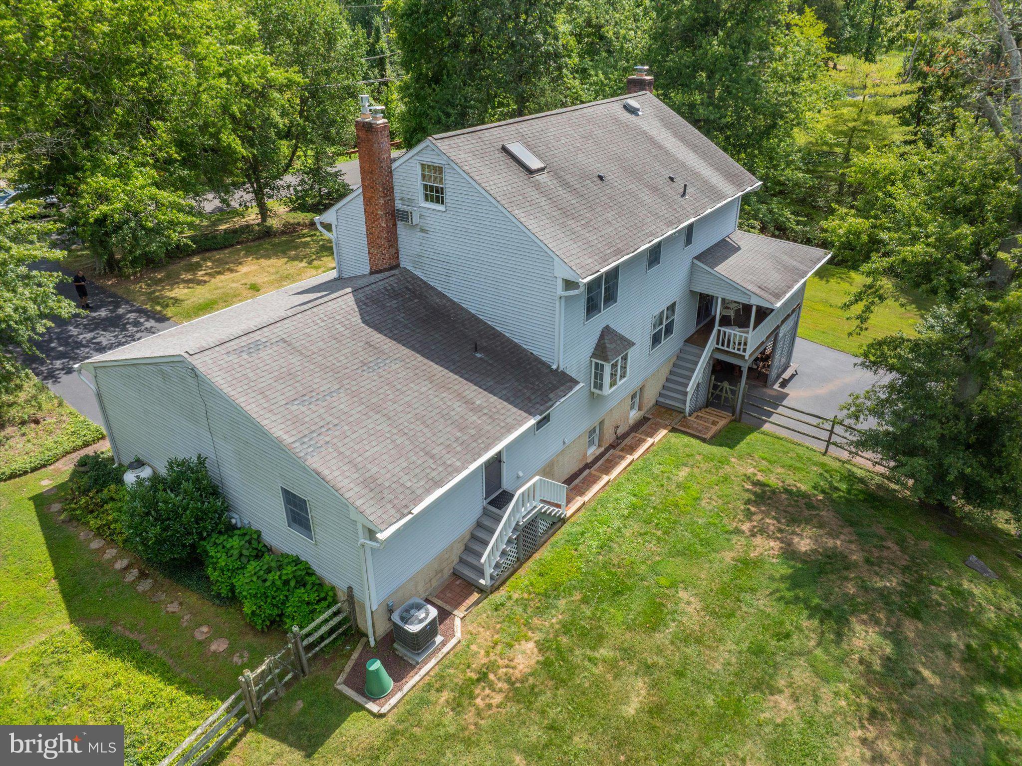 1655 Kriebel Mill Road Collegeville, PA 19426 - Photo 53 of 57 an aerial view of a house with a yard and swimming pool