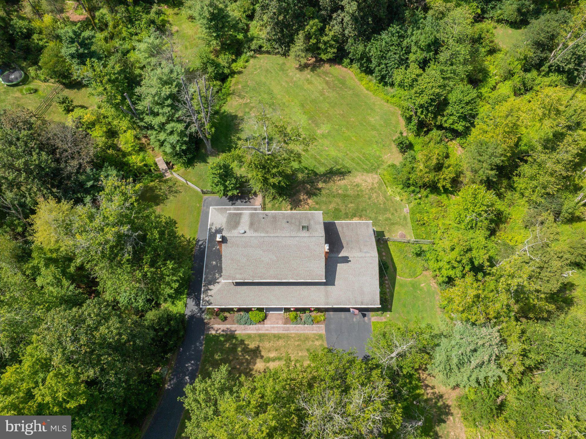 1655 Kriebel Mill Road Collegeville, PA 19426 - Photo 57 of 57 an aerial view of residential house with outdoor space and trees all around