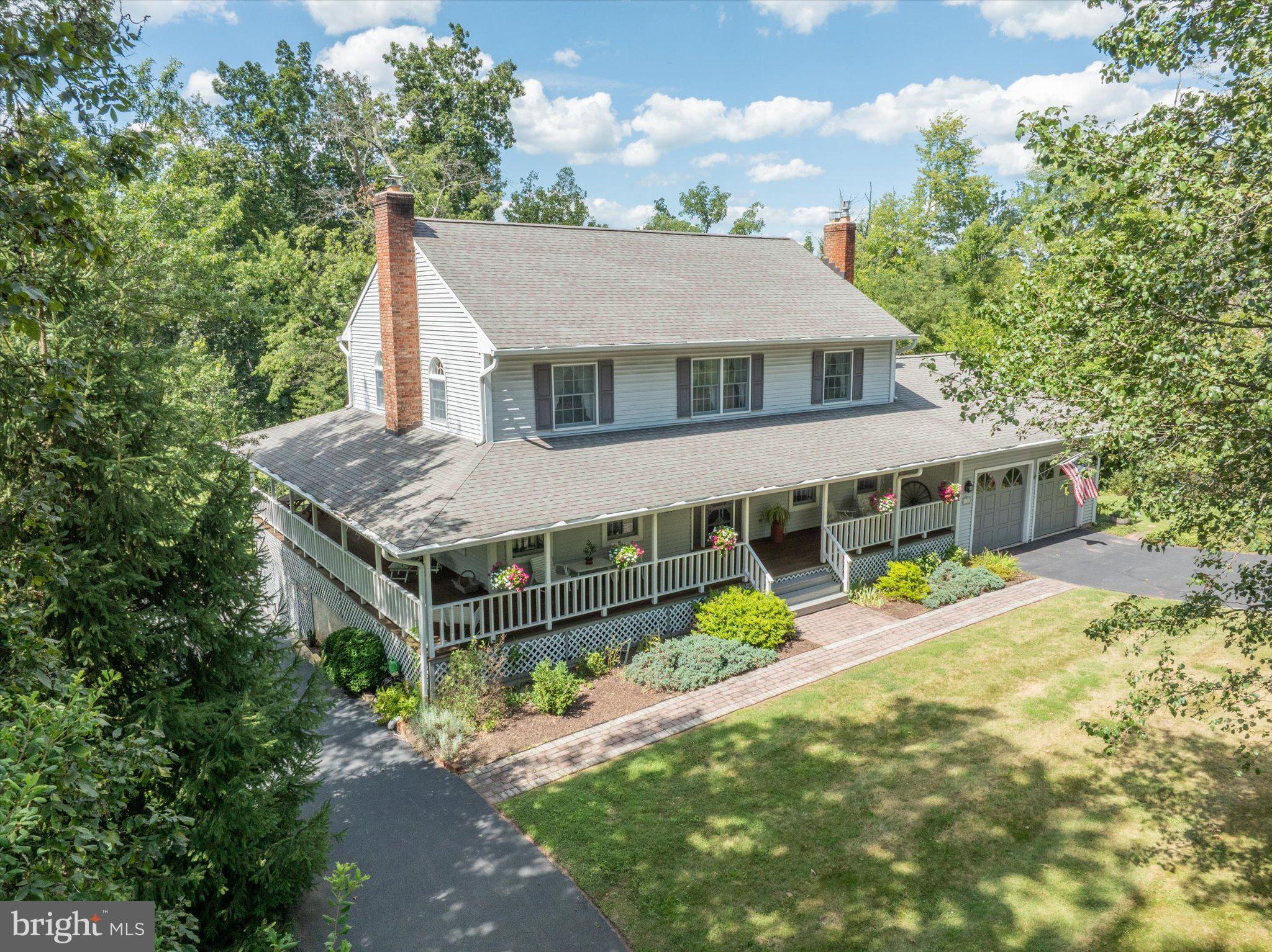 1655 Kriebel Mill Road Collegeville, PA 19426 - Photo 7 of 57 an aerial view of a house with a yard