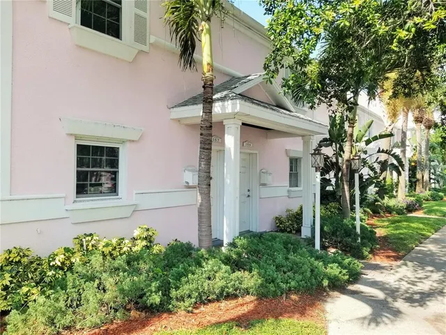 front view of a house with a small yard