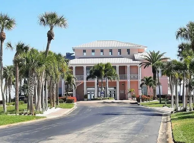 an open kitchen with dining table and chairs
