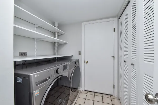 a bathroom with a sink toilet and mirror
