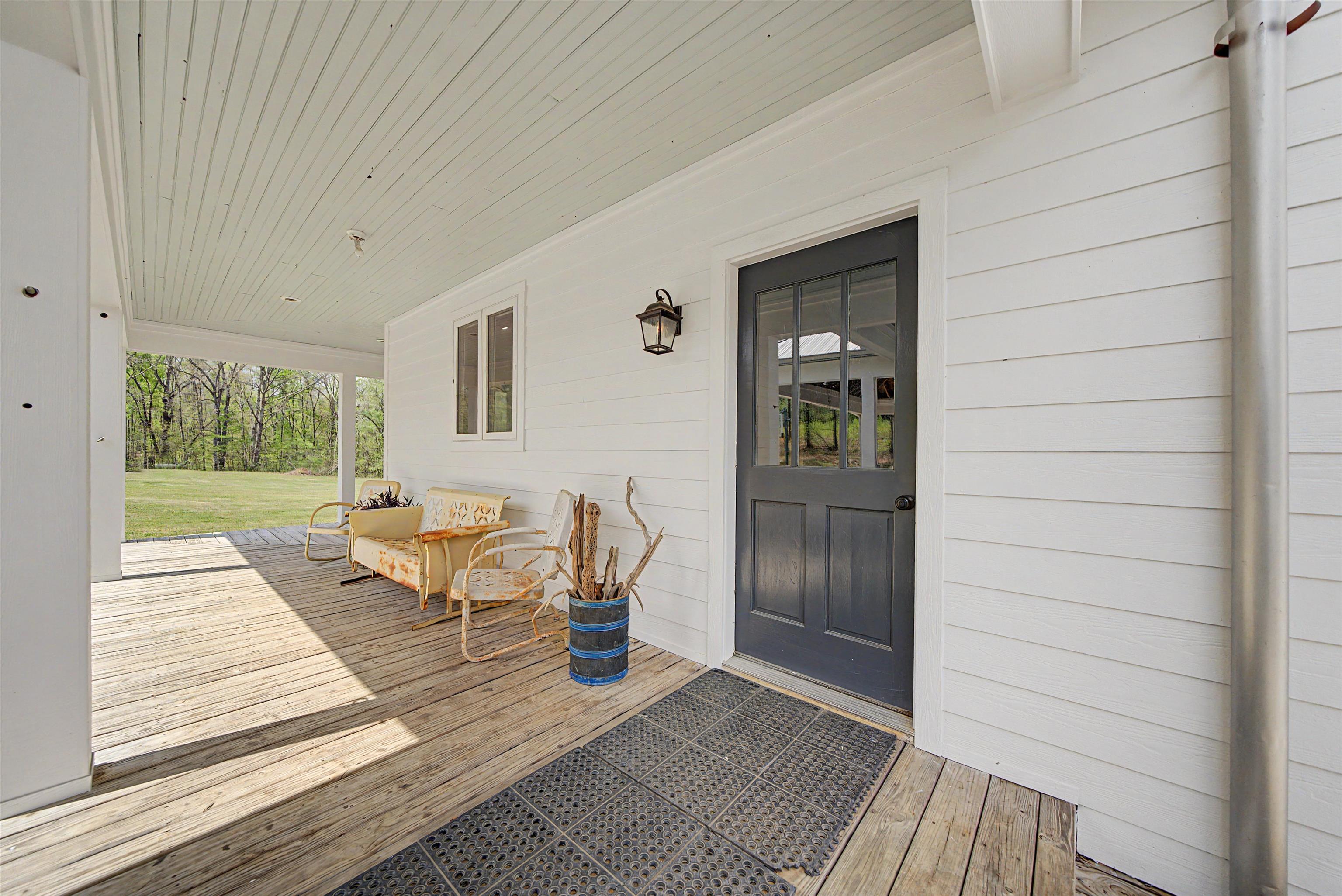 300 Grace Thomas Road Michie, TN 38357 - Photo 17 of 26 Entrance to property with a wooden deck