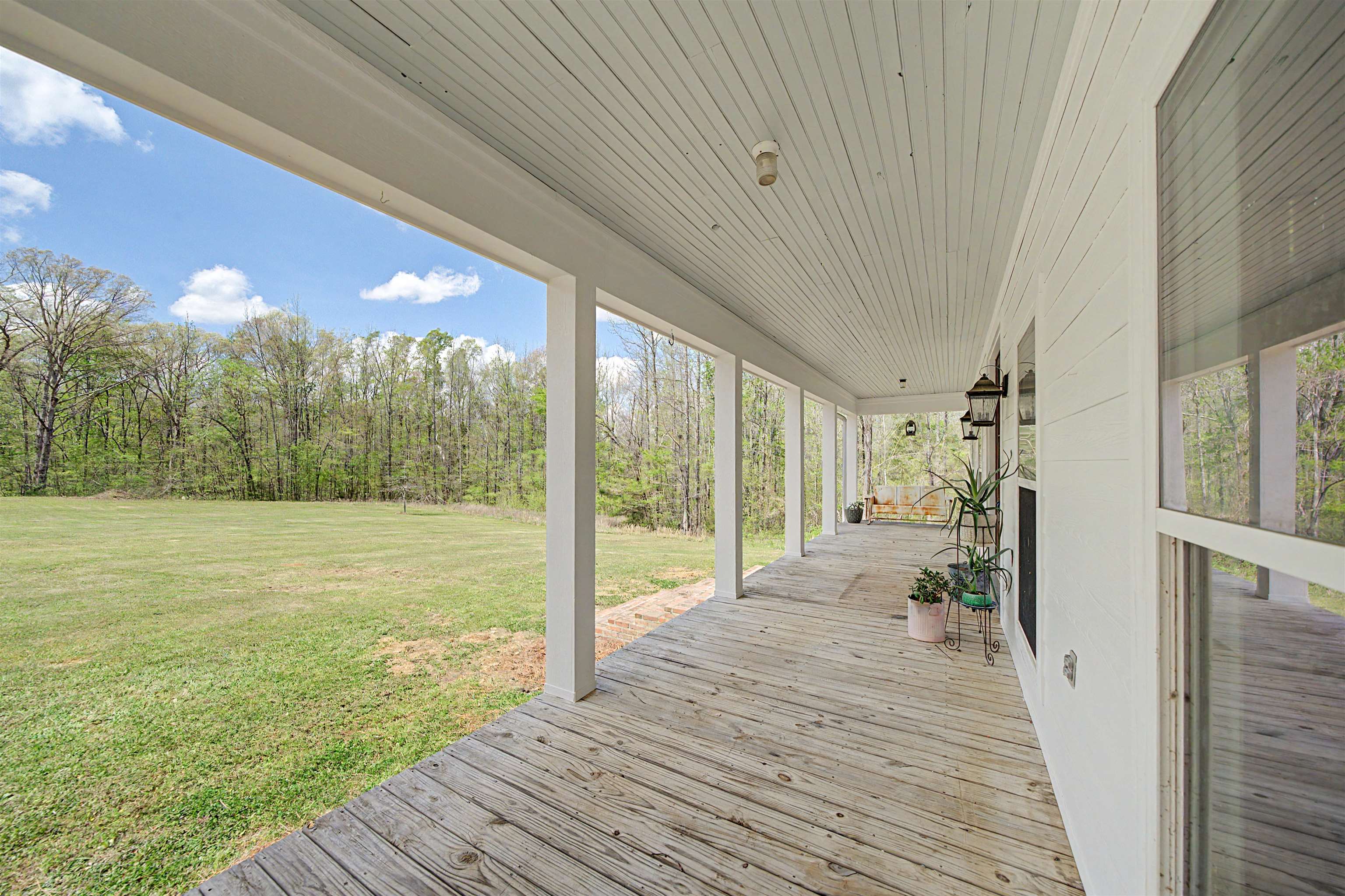 300 Grace Thomas Road Michie, TN 38357 - Photo 21 of 26 Porch featuring a lawn