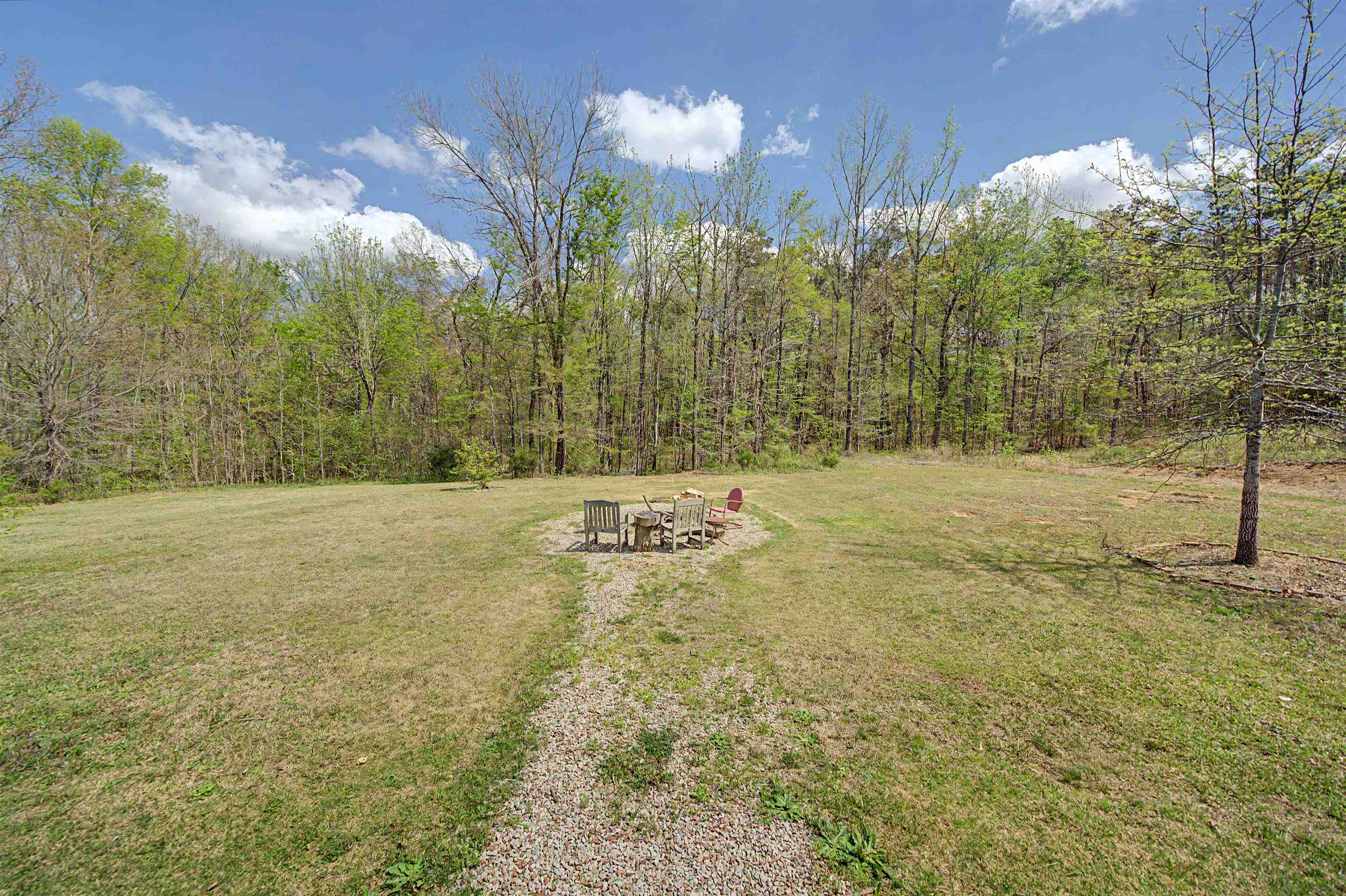 300 Grace Thomas Road Michie, TN 38357 - Photo 24 of 26 View of grassy yard with a patio