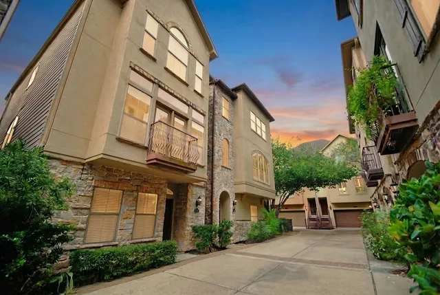 a bathroom with a sink a toilet and vanity