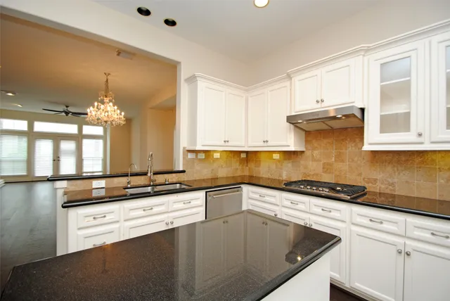 a row of table and chairs in front of building